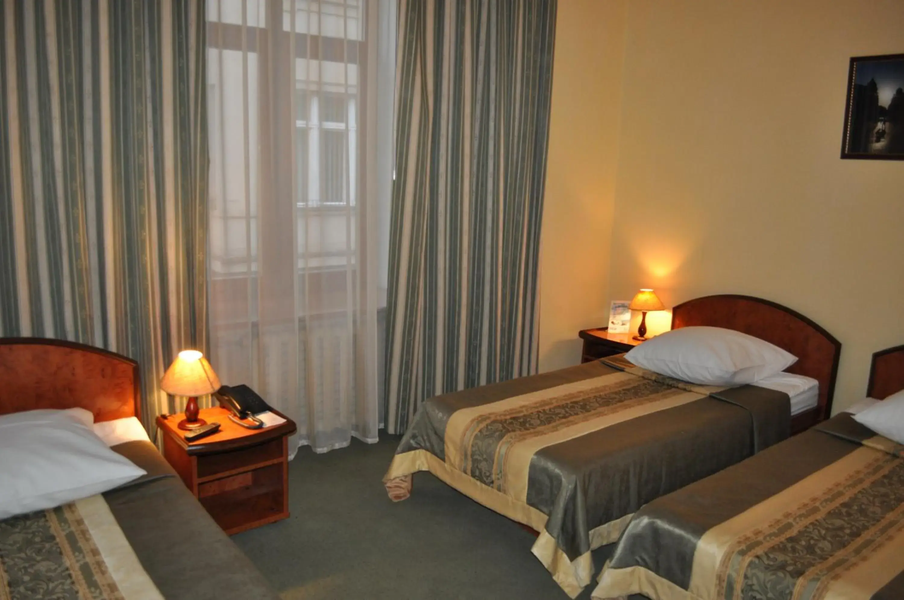 Standard Triple Room in Wien Hotel Standard Triple Room in Wien Hotel