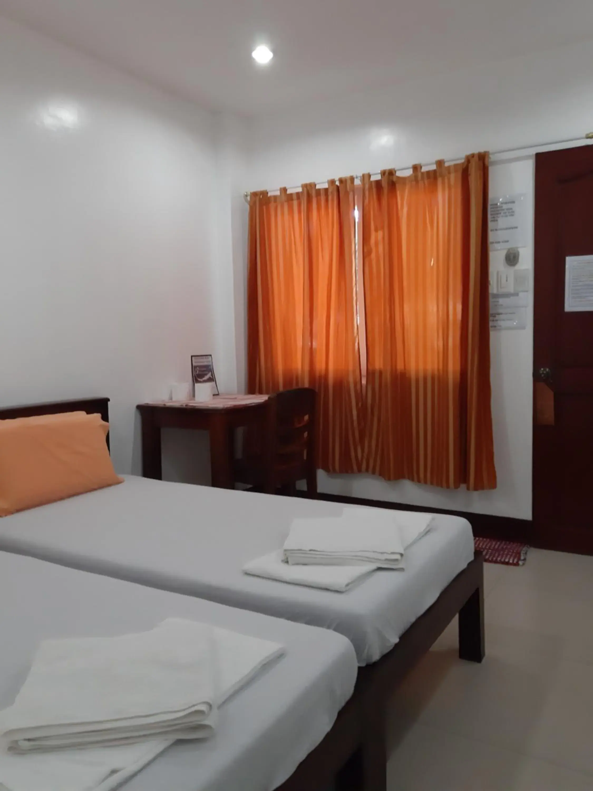 Bed in SLAM'S Garden Dive Resort Bed in SLAM'S Garden Dive Resort