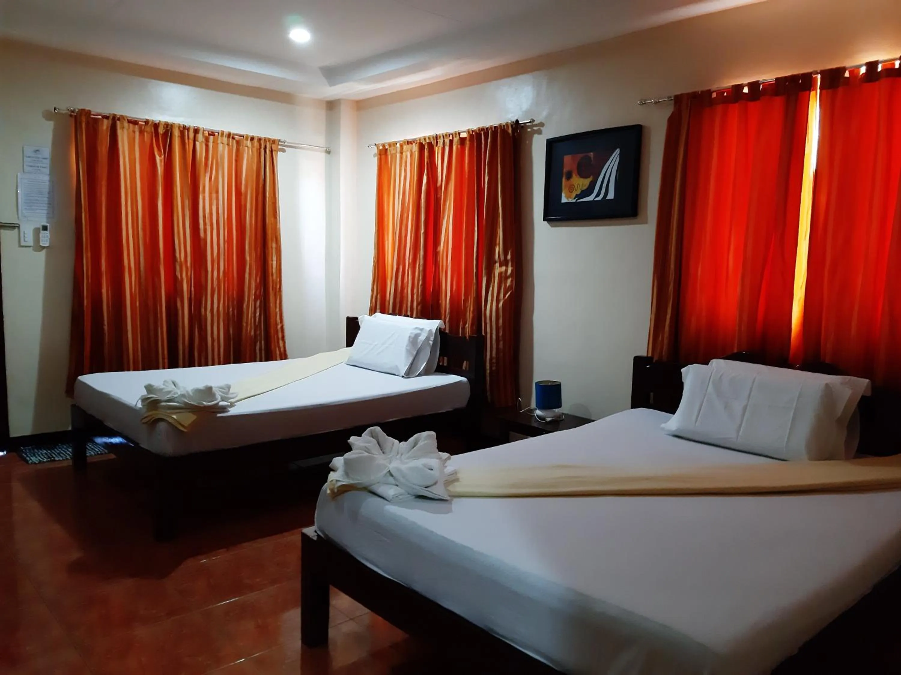 Bed in SLAM'S Garden Dive Resort