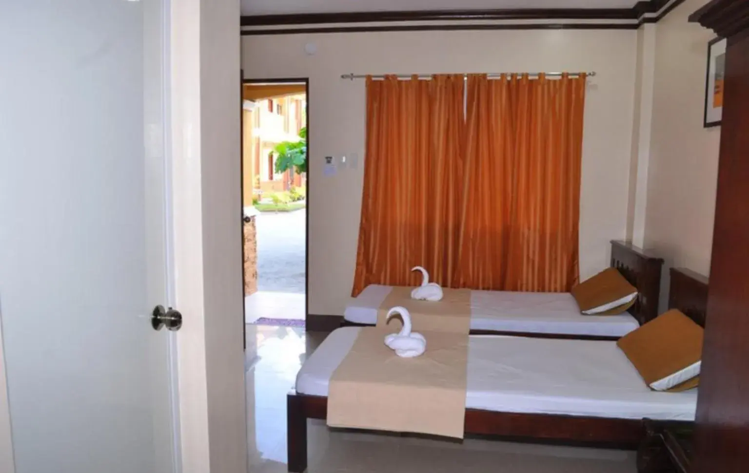 Bed in SLAM'S Garden Dive Resort Bed in SLAM'S Garden Dive Resort