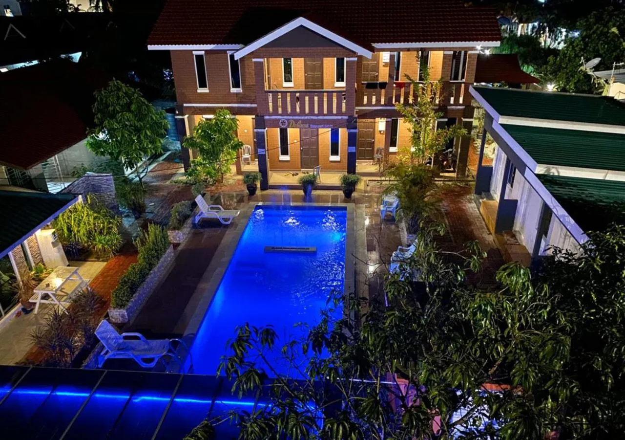 Swimming pool in D'Lima Beach Inn