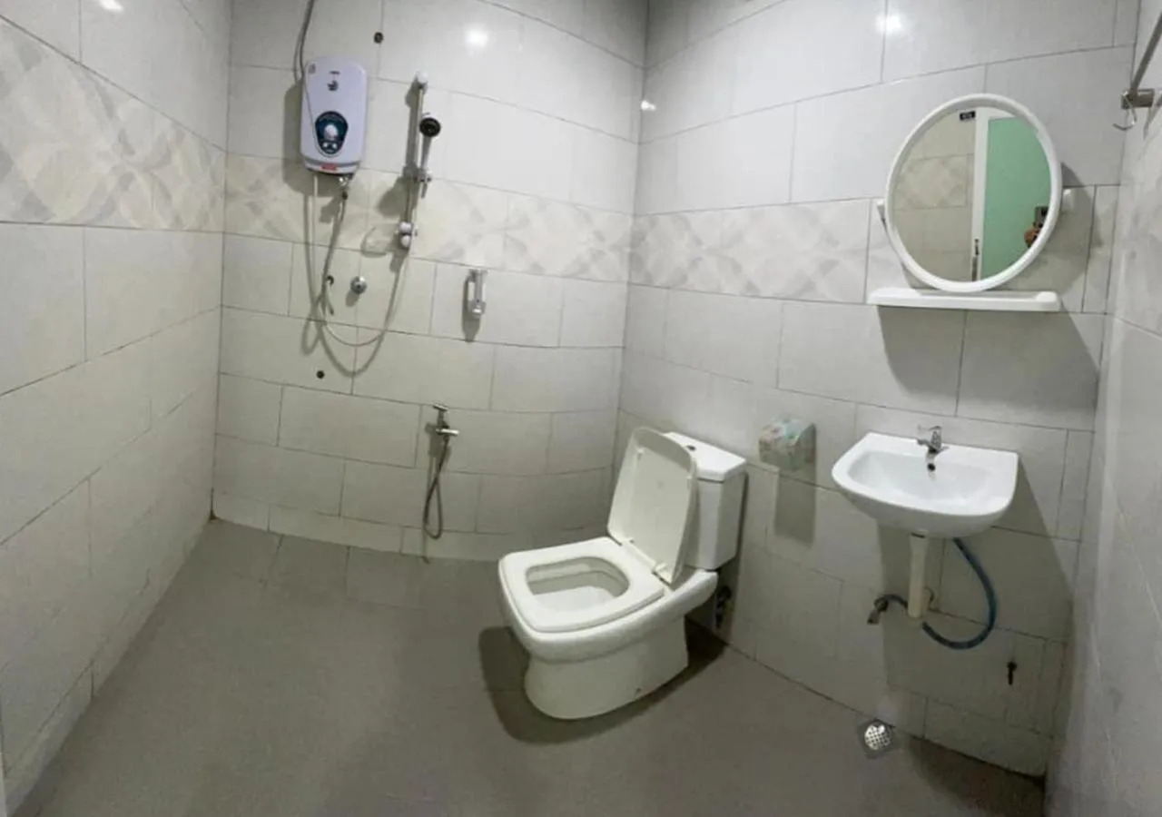 Bathroom in D'Lima Beach Inn