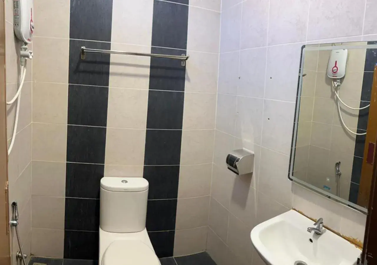 Bathroom in D'Lima Beach Inn Bathroom in D'Lima Beach Inn