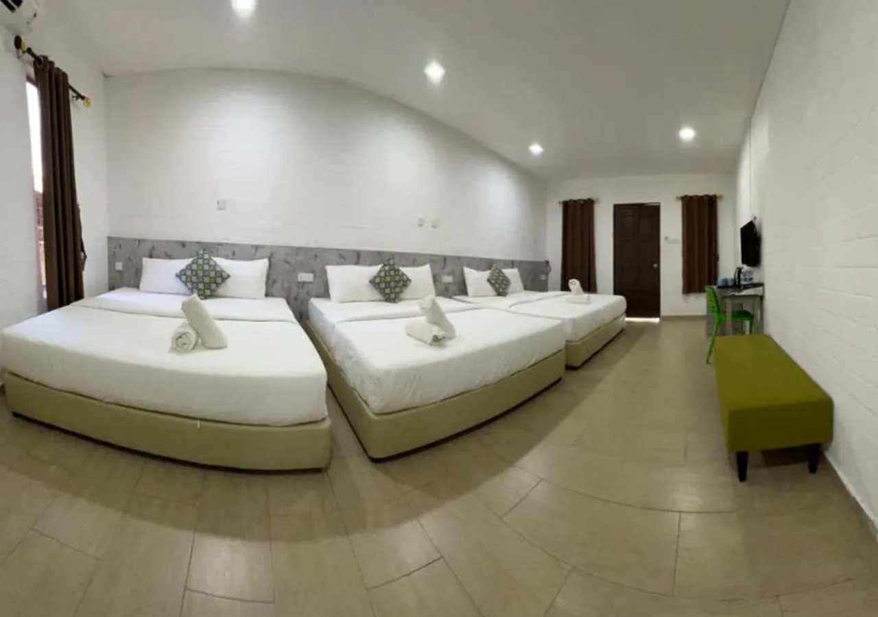 Photo of the whole room, Bed in D'Lima Beach Inn