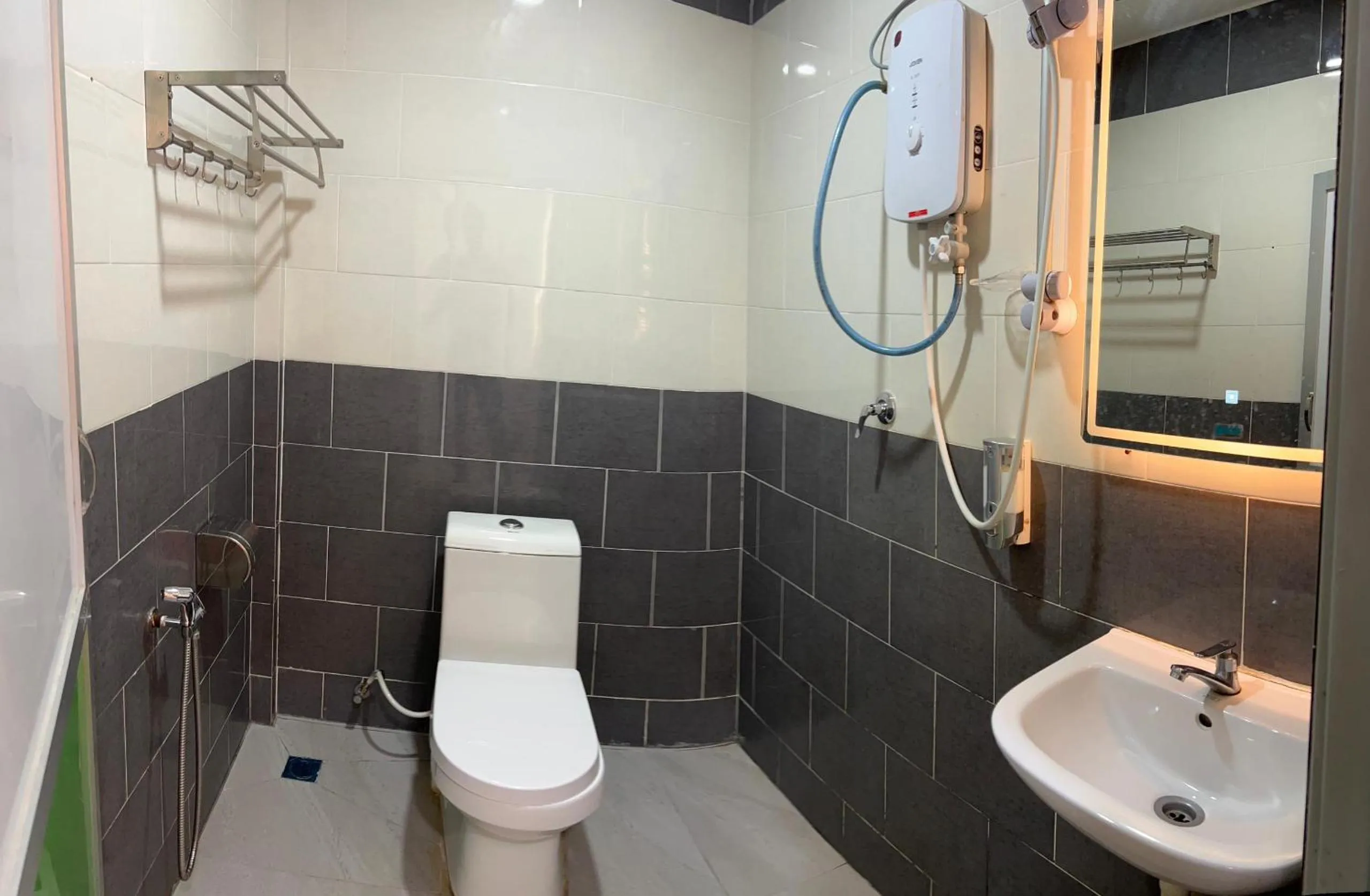 Bathroom in D'Lima Beach Inn