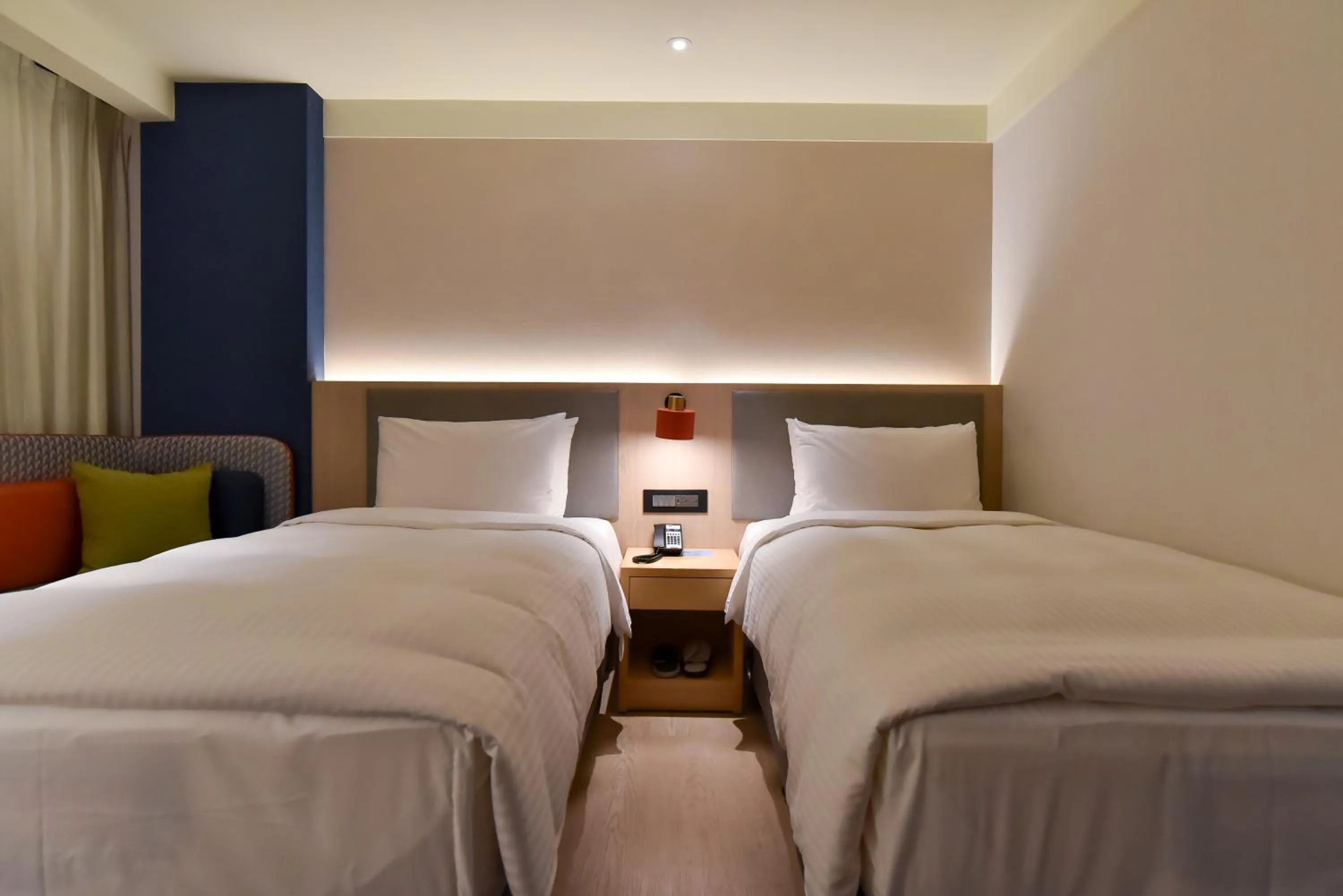 Bed in Holiday Inn Express Taipei Train Station by IHG