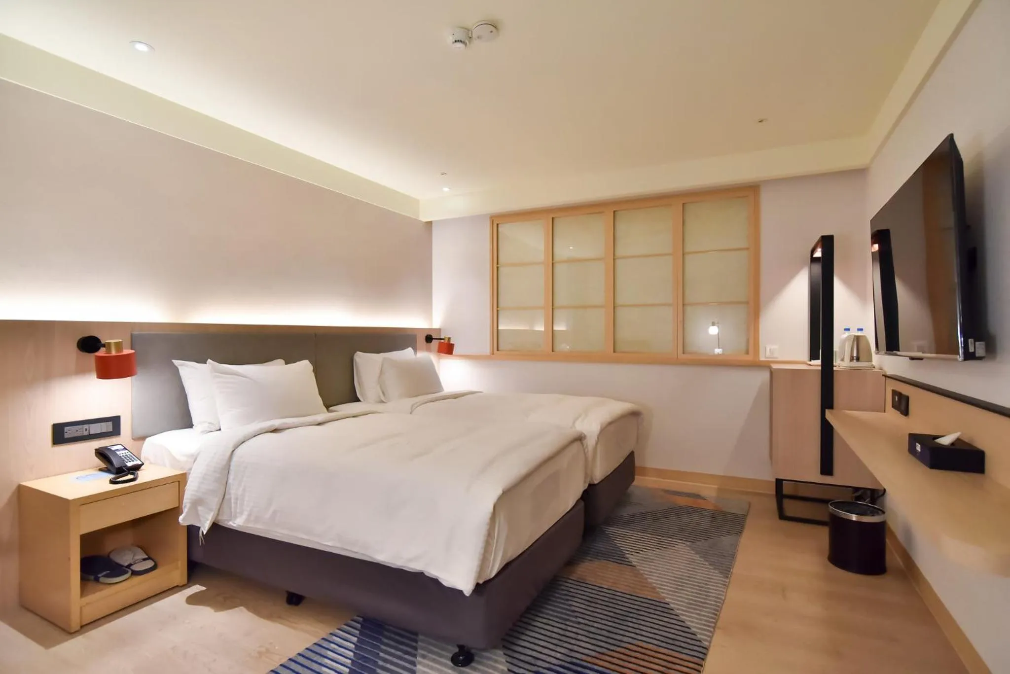 Photo of the whole room, Bed in Holiday Inn Express Taipei Train Station by IHG