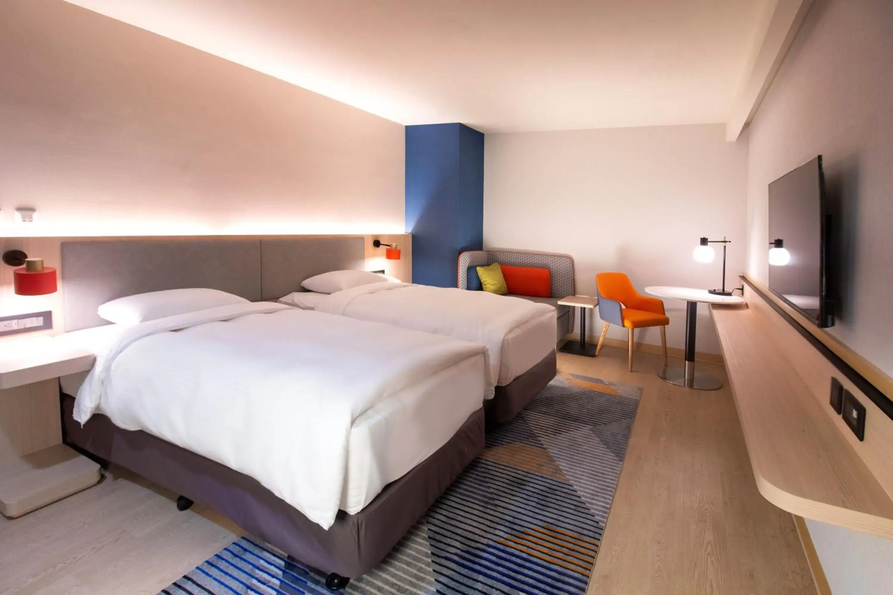 Bed in Holiday Inn Express Taipei Train Station by IHG Bed in Holiday Inn Express Taipei Train Station by IHG