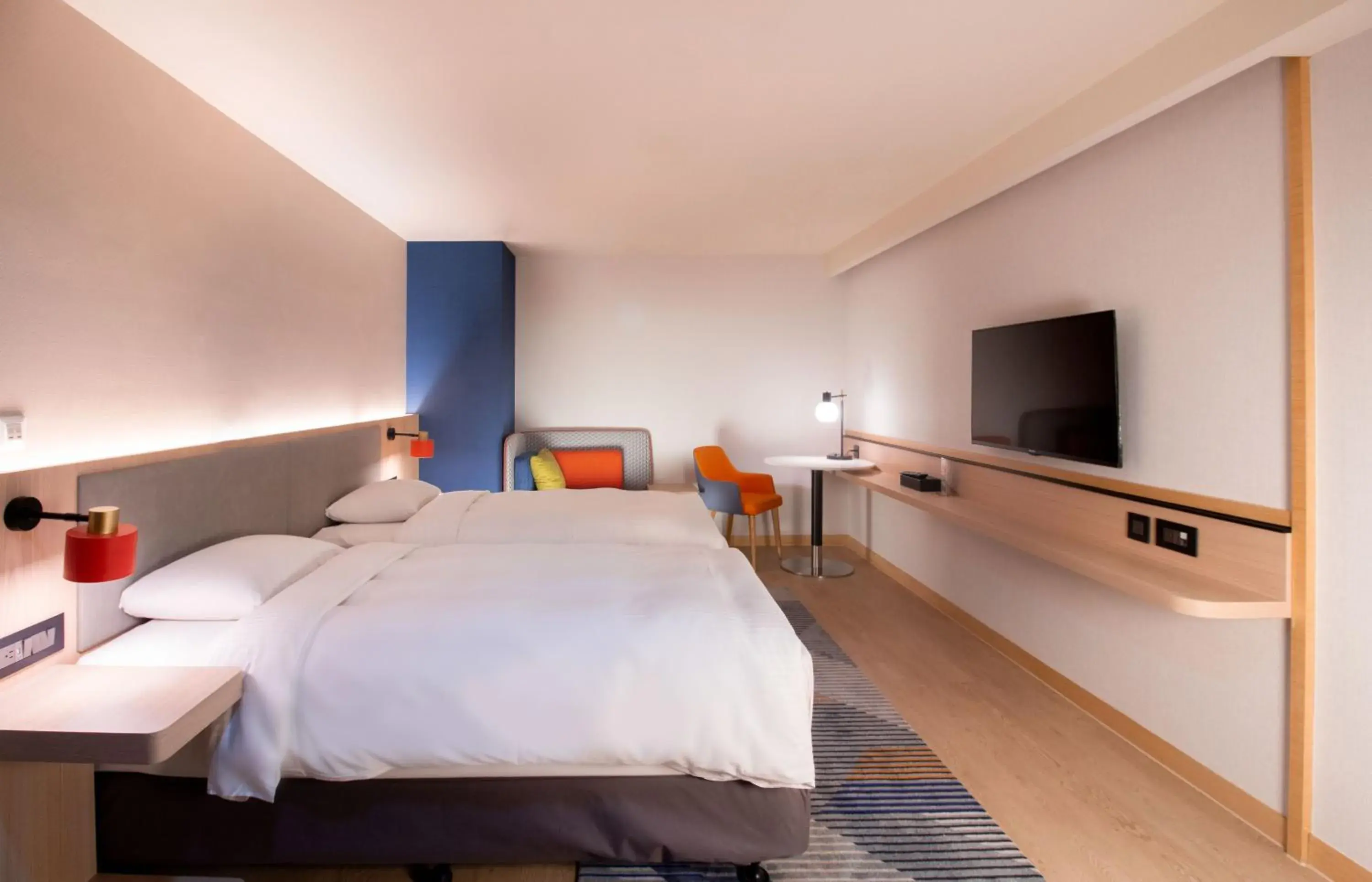 Bed in Holiday Inn Express Taipei Train Station by IHG Bed in Holiday Inn Express Taipei Train Station by IHG