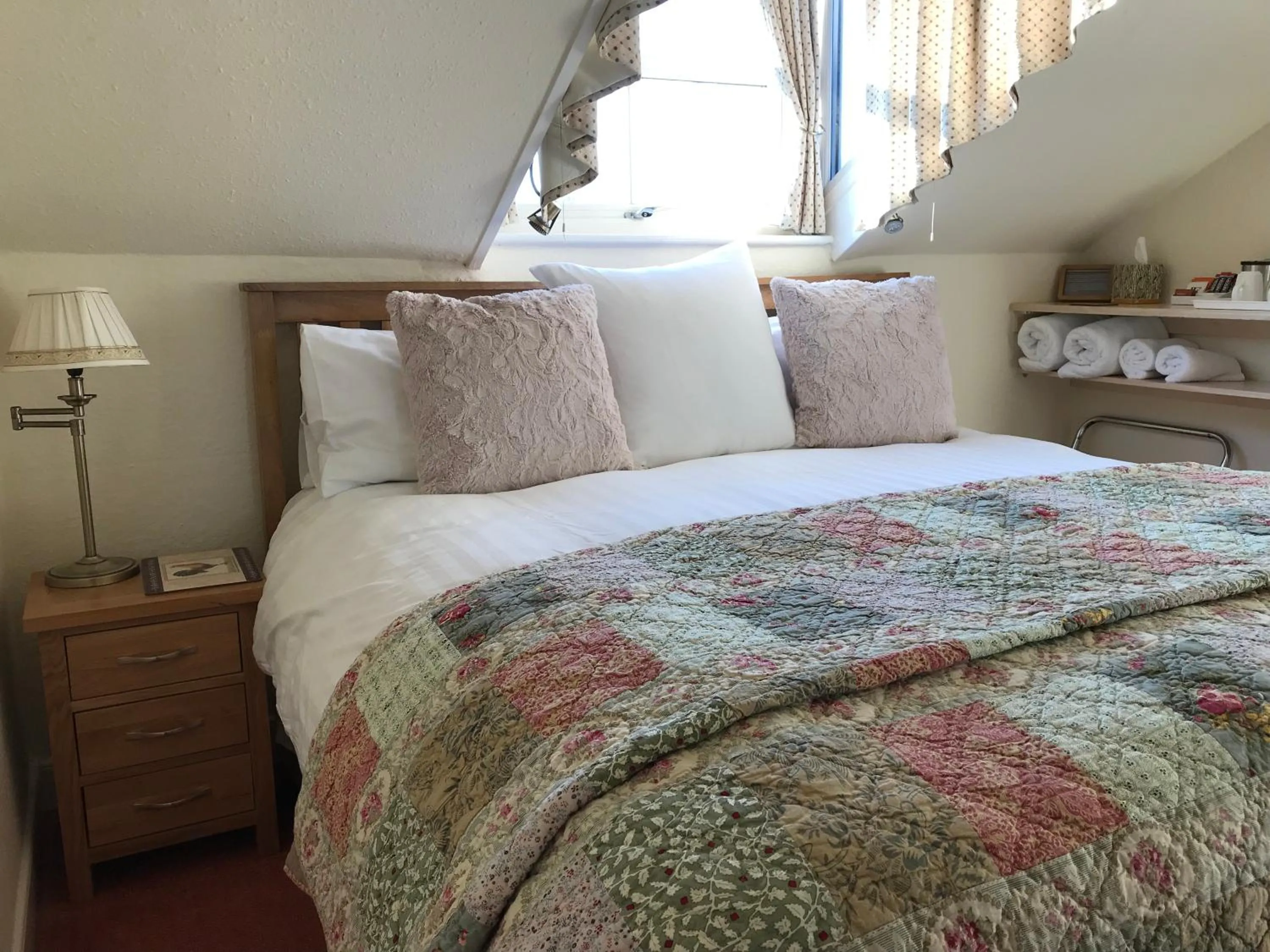 Bed in May Cottage B&B