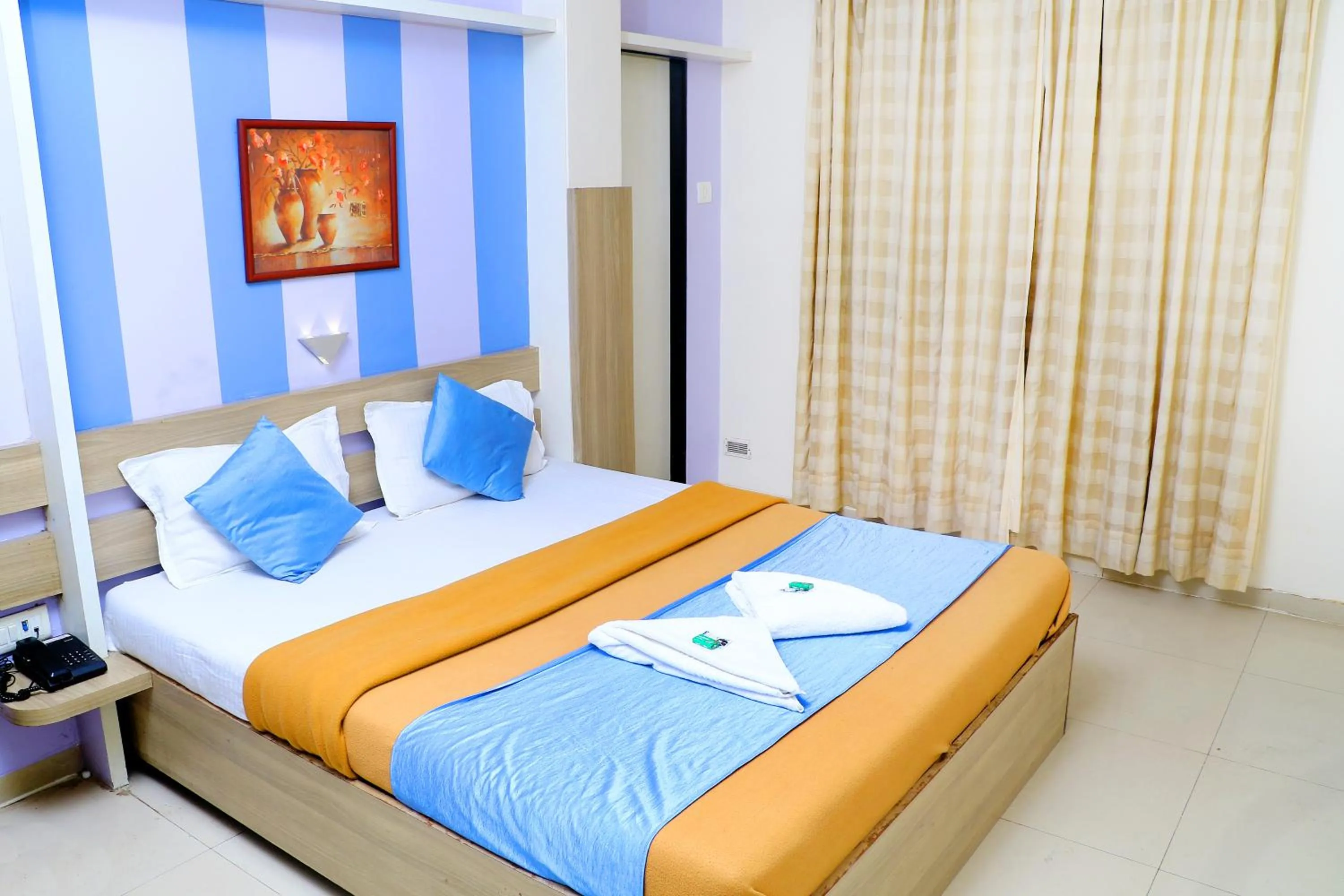 Photo of the whole room, Bed in Hotel Alka Residency