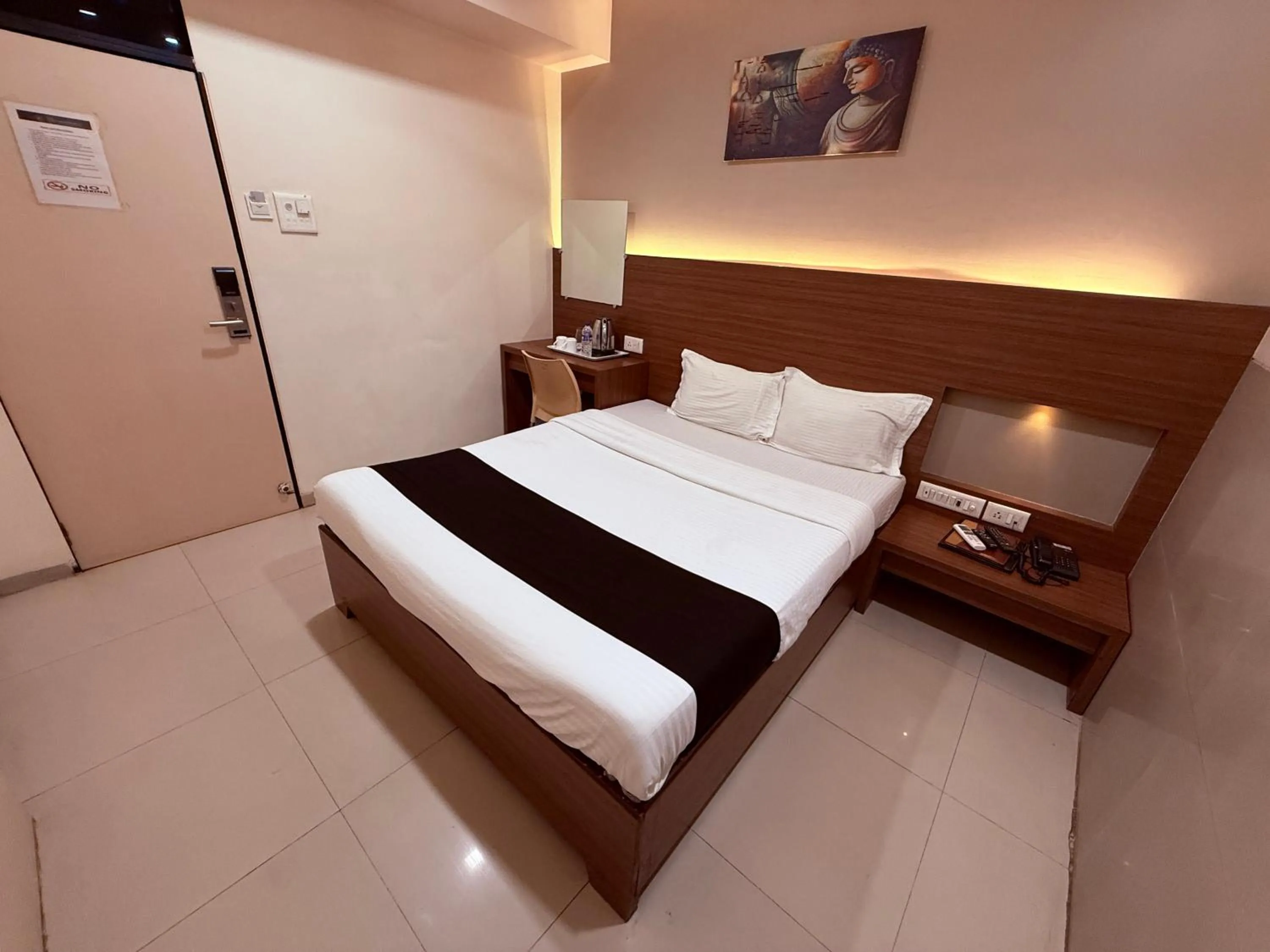 Bed in Hotel Alka Residency