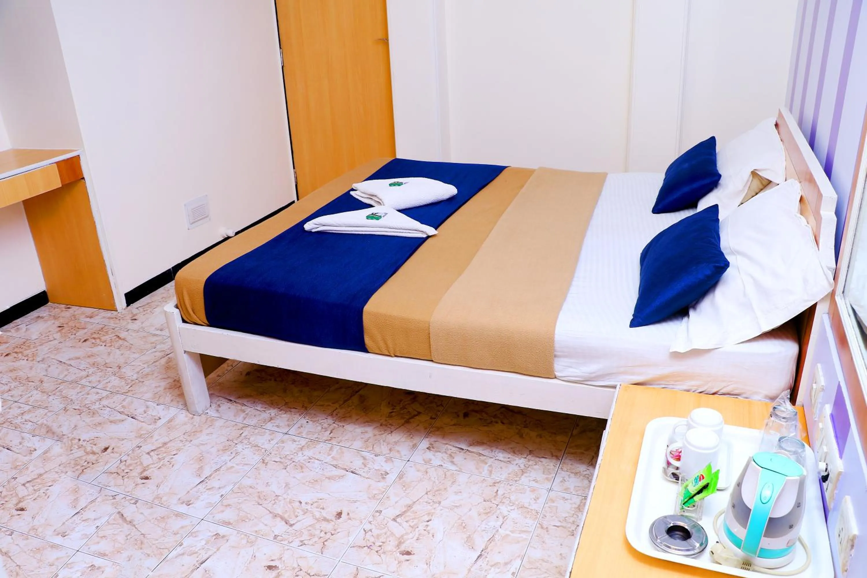 Bed in Hotel Alka Residency