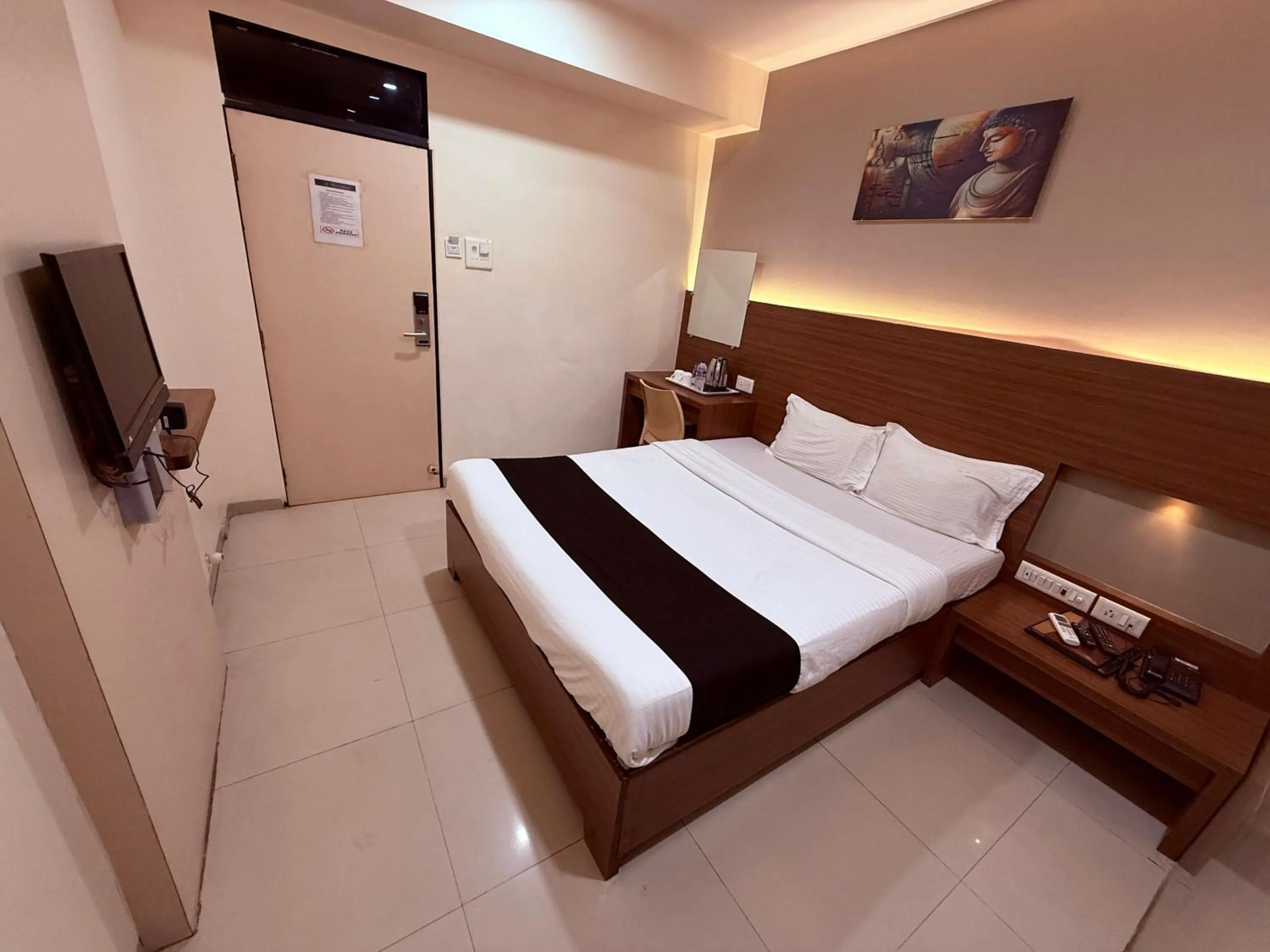 Bed in Hotel Alka Residency