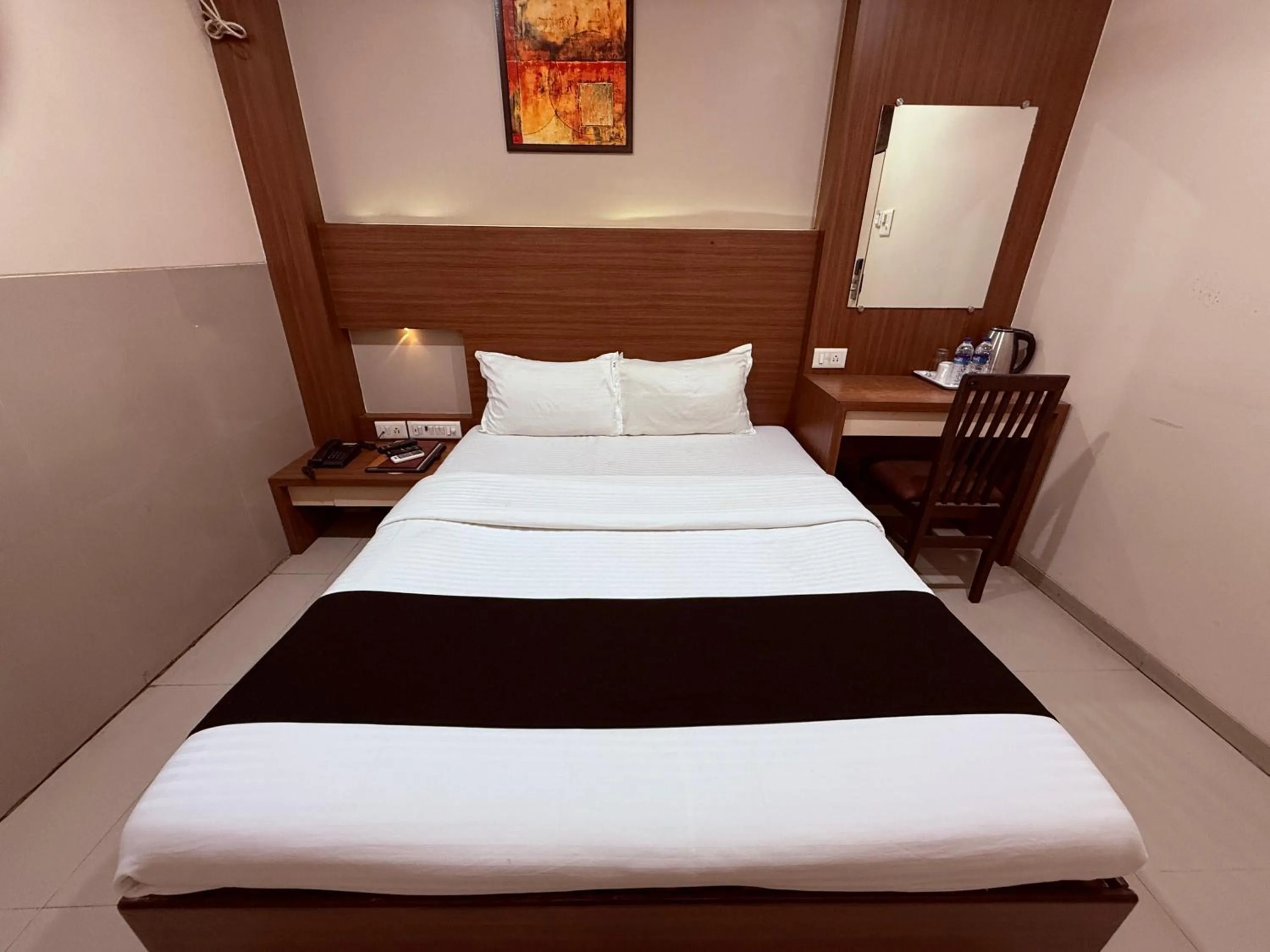 Bed in Hotel Alka Residency
