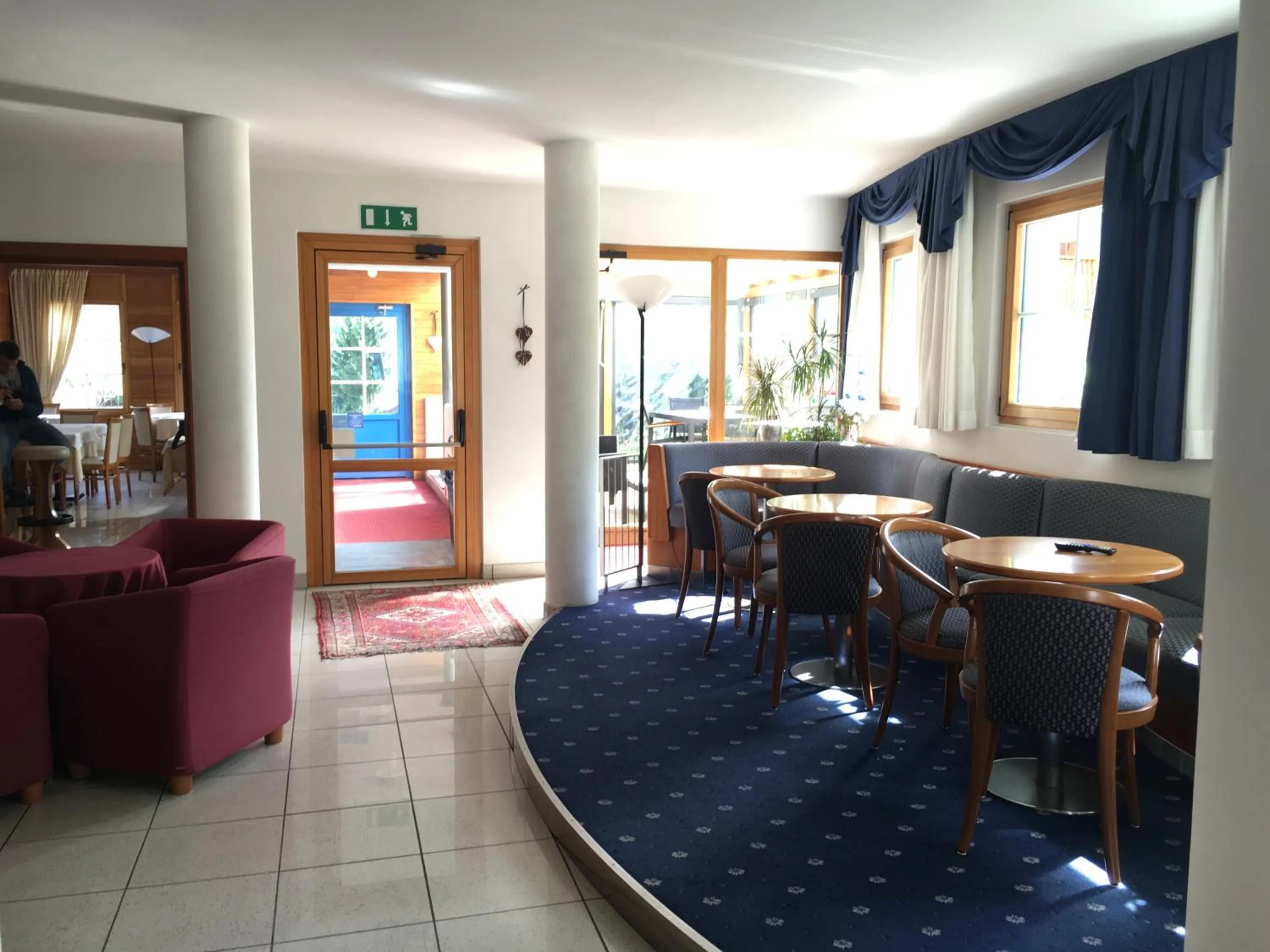 Communal lounge/ TV room in Garni Enrosadira