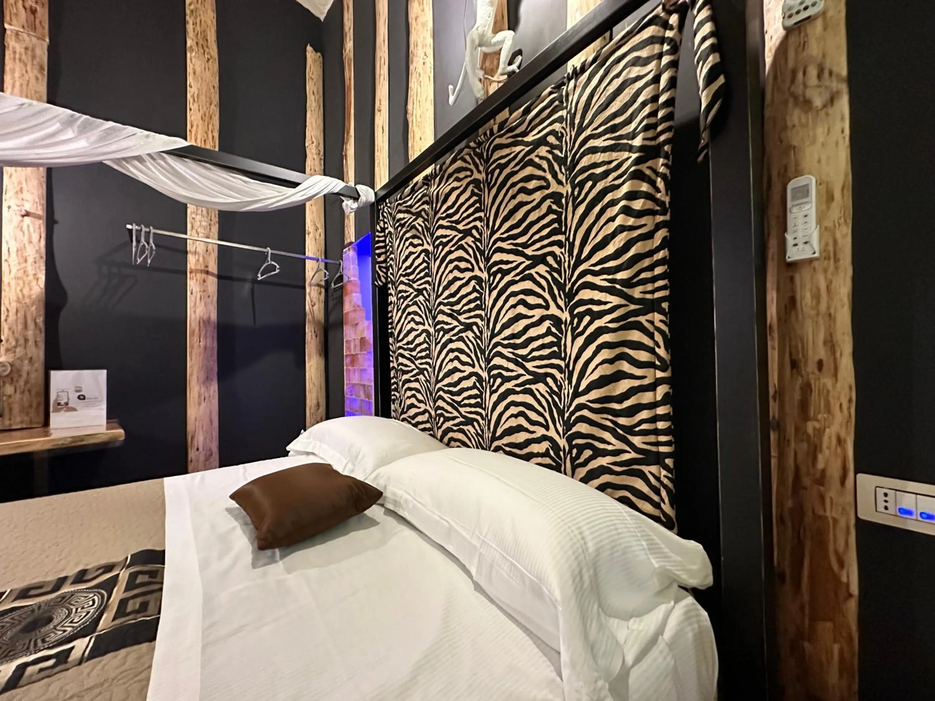 Bed in The Bridge Suites