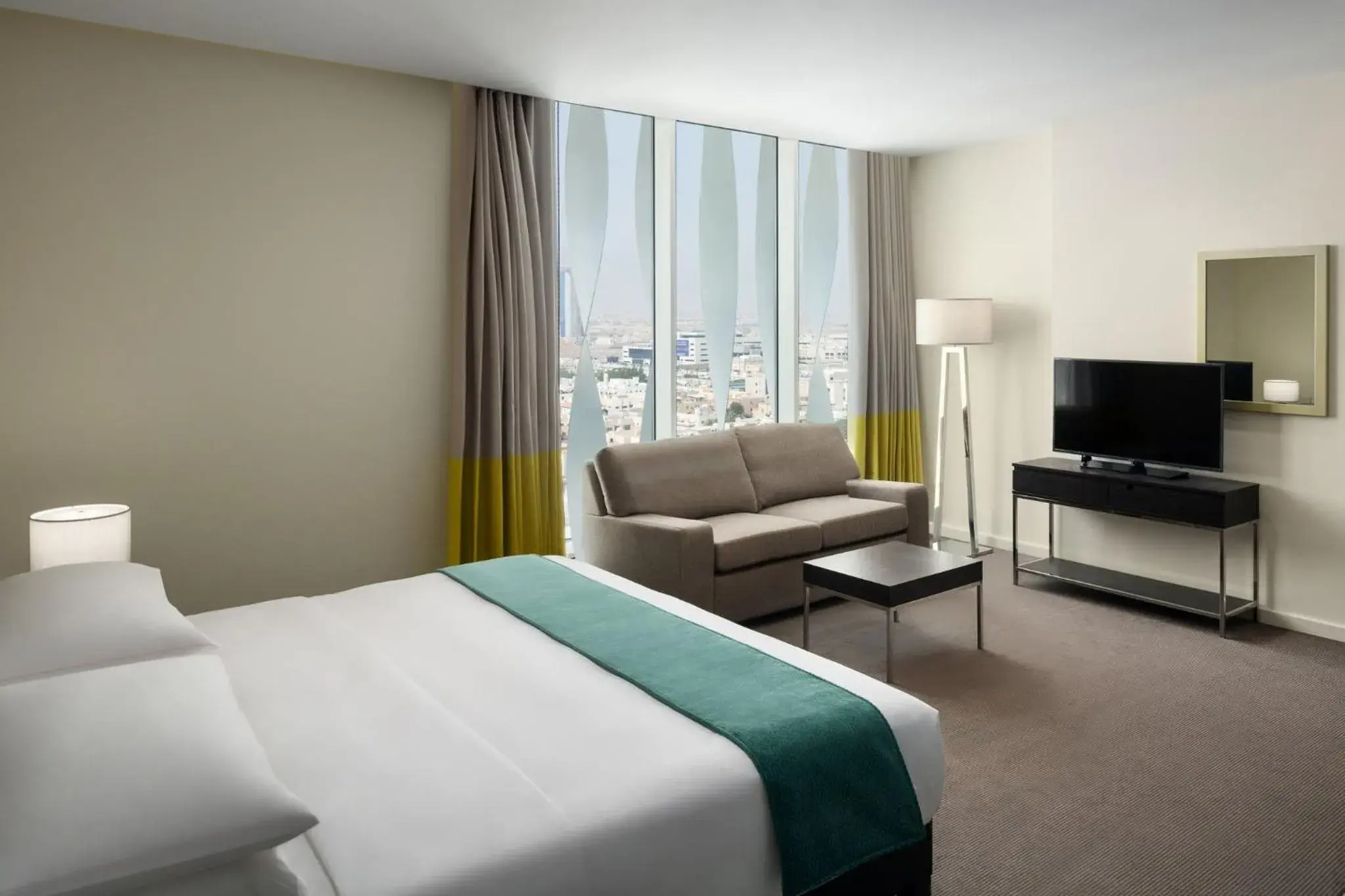 Photo of the whole room, Bed in Staybridge Suites Al Khobar by IHG Photo of the whole room, Bed in Staybridge Suites Al Khobar by IHG