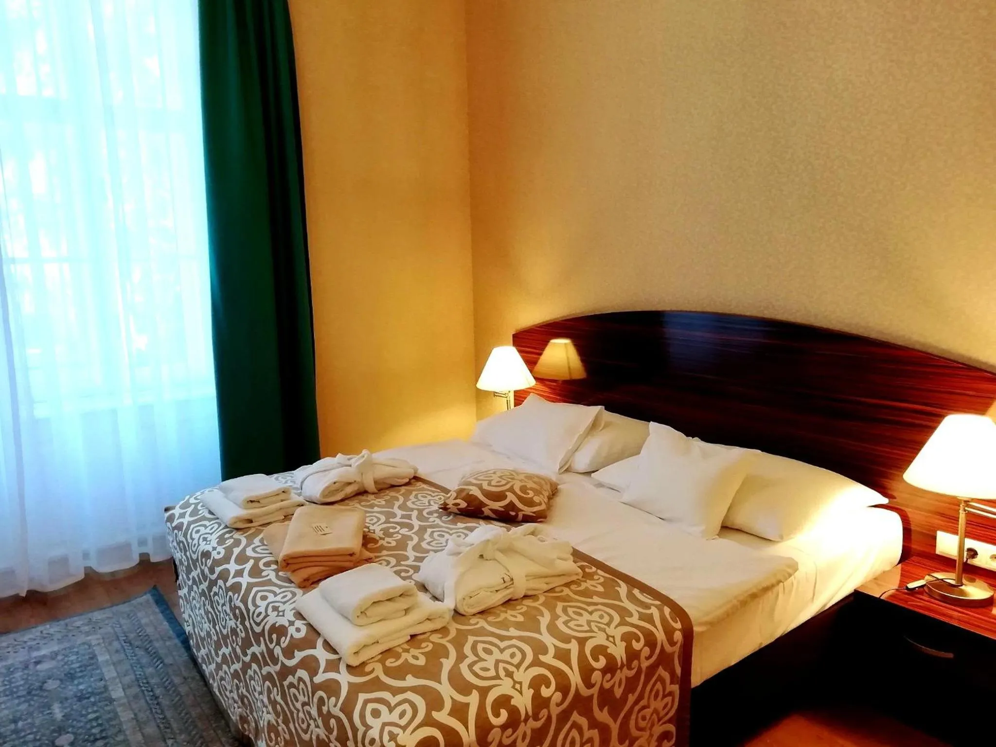 Photo of the whole room, Bed in Batthyány Kastélyszálló