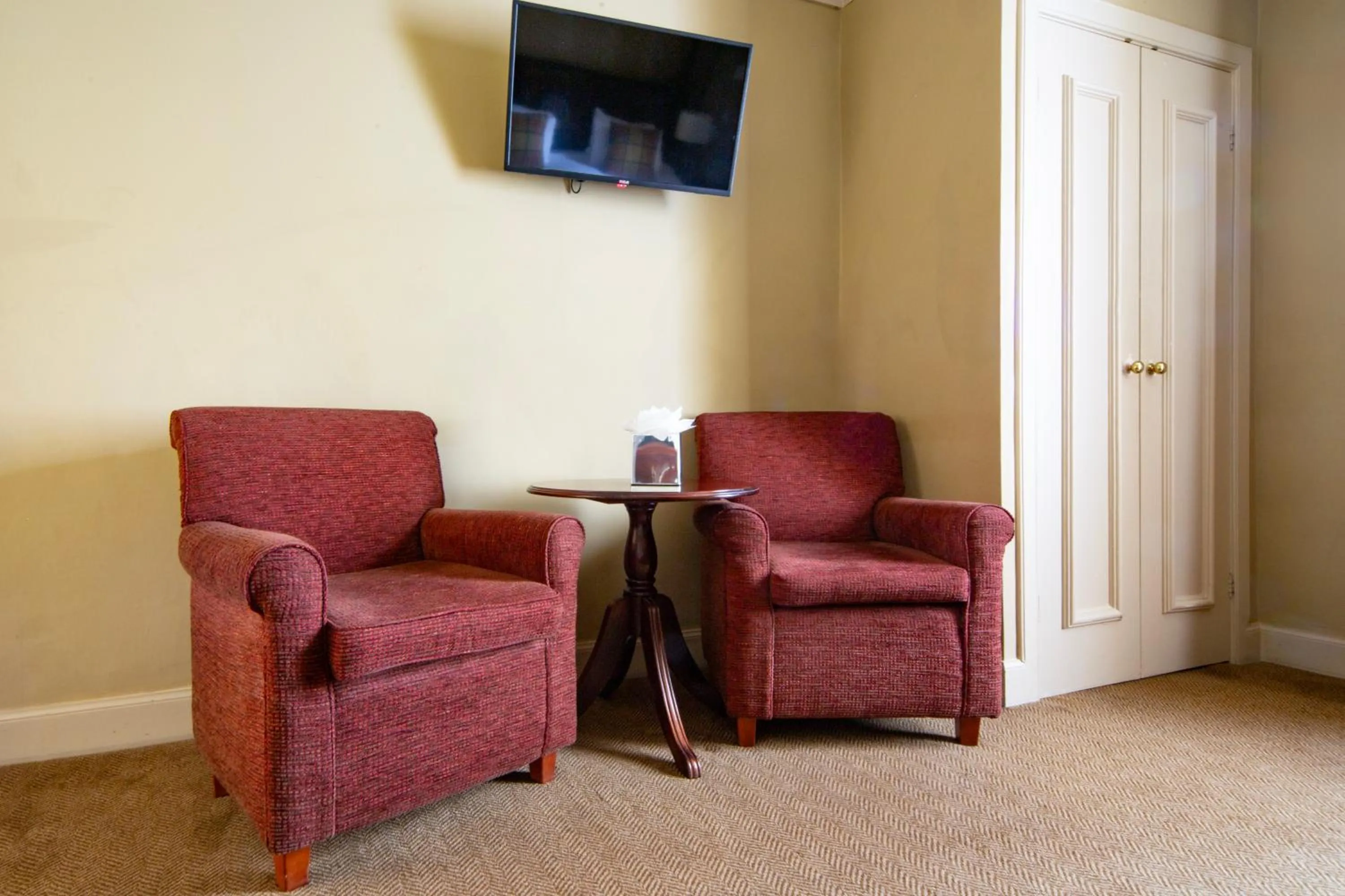 Bedroom in The Tontine Hotel