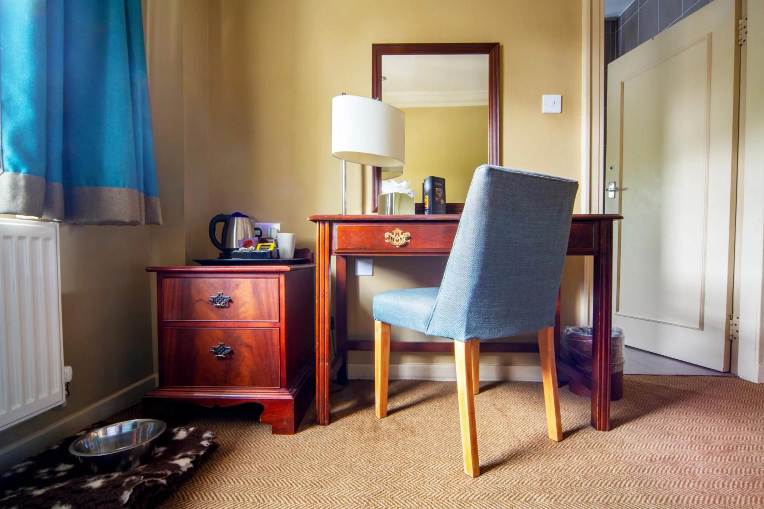 Bedroom in The Tontine Hotel