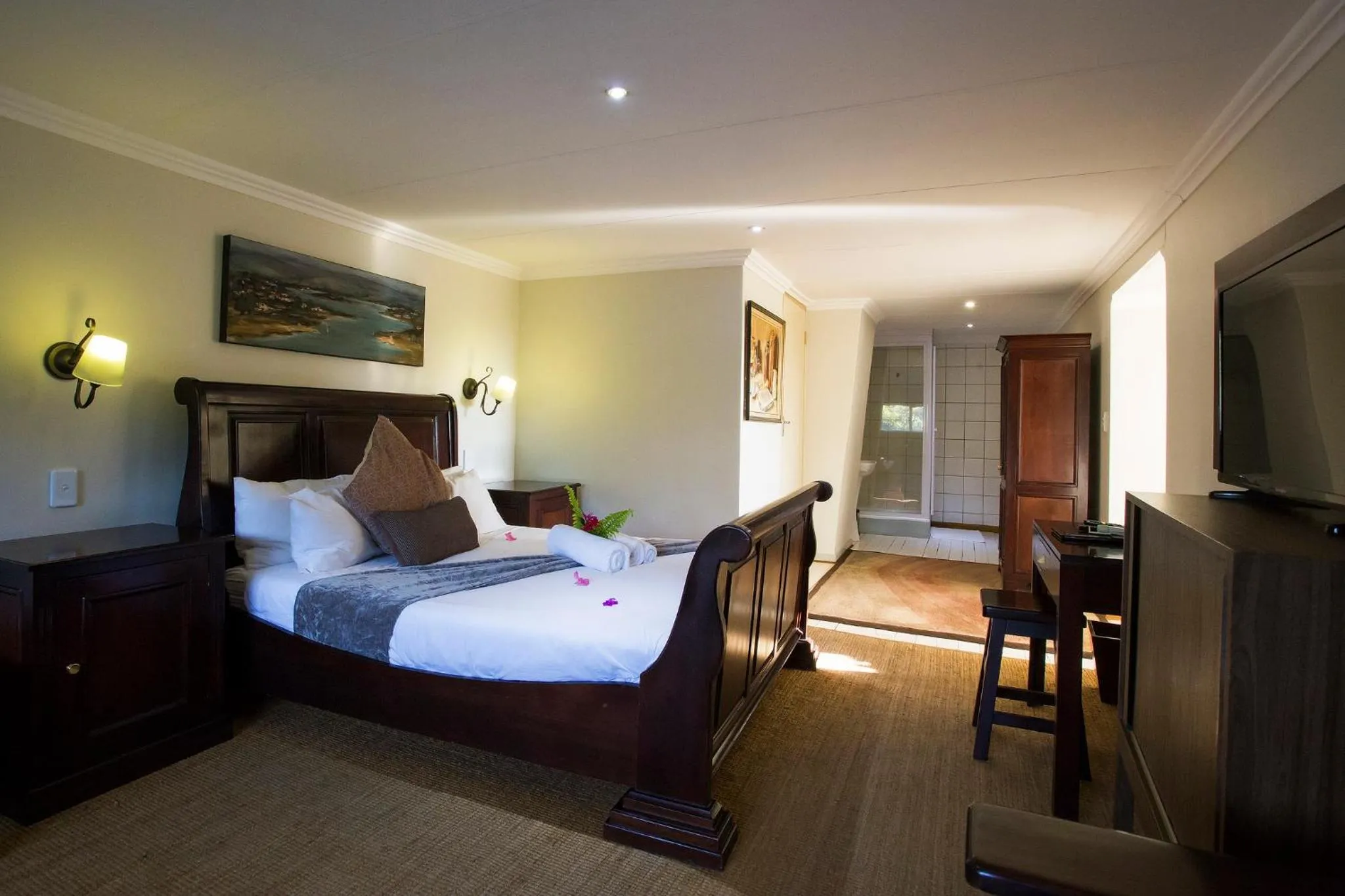 Bed in Tamboti Lodge Guest House