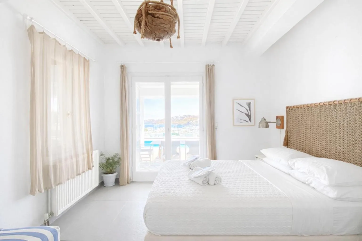Bed in Amperian Mykonos Suites & Villas