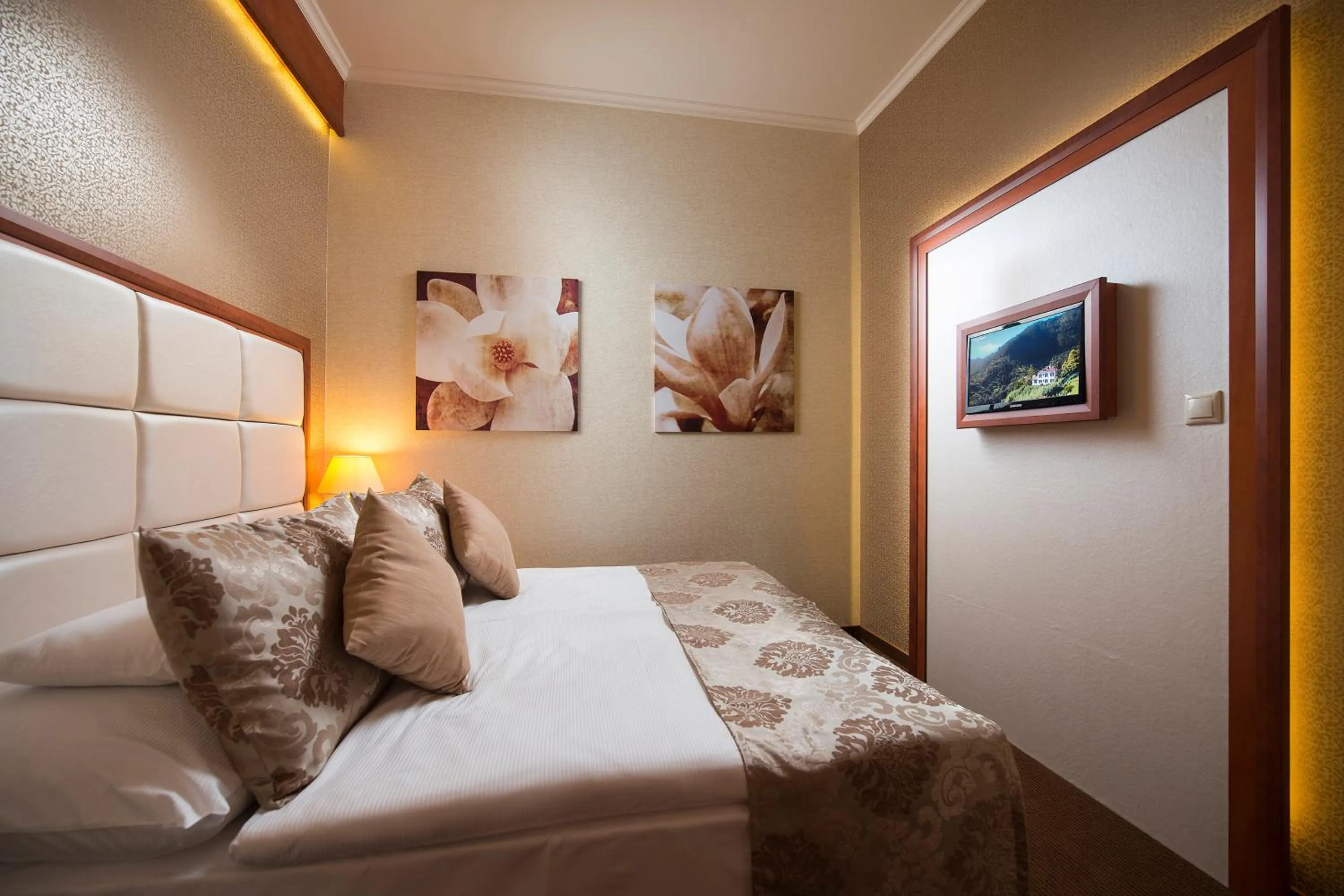 Bed in Aventinus Hotel