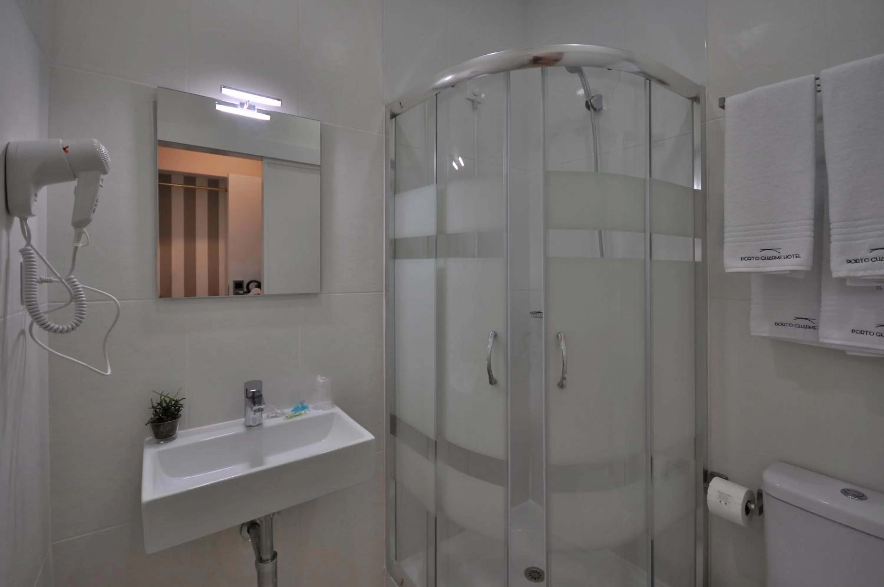 Bathroom in Porto Charming Hotel