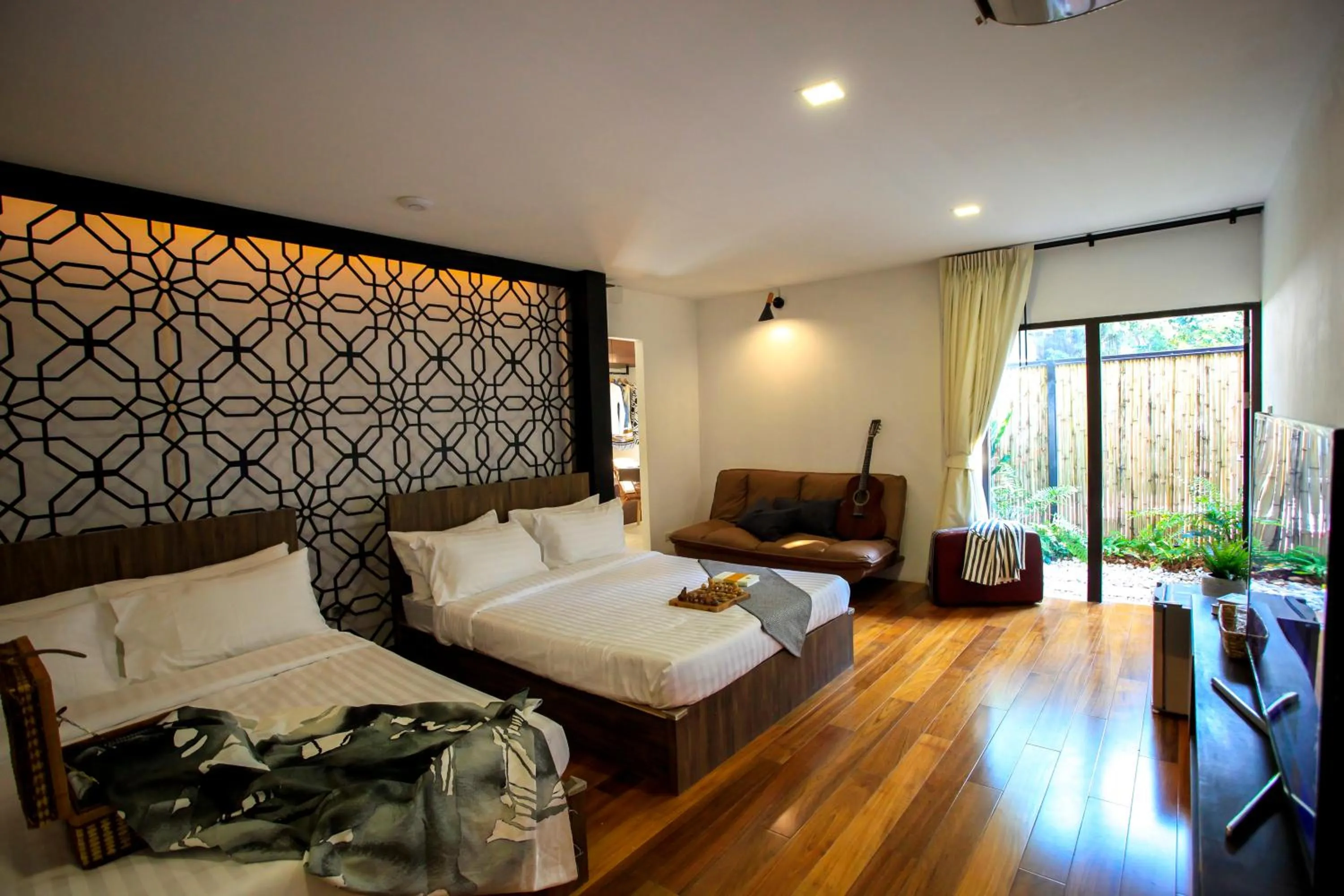 Photo of the whole room, Bed in Siam Nitra Boutique Hotel