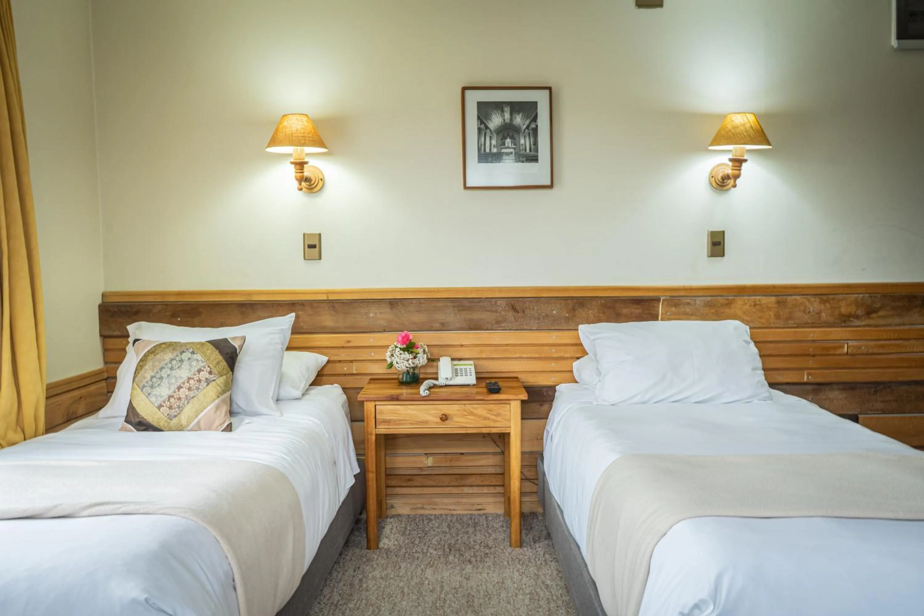 Bed in Hotel Museo El Greco Puerto Varas