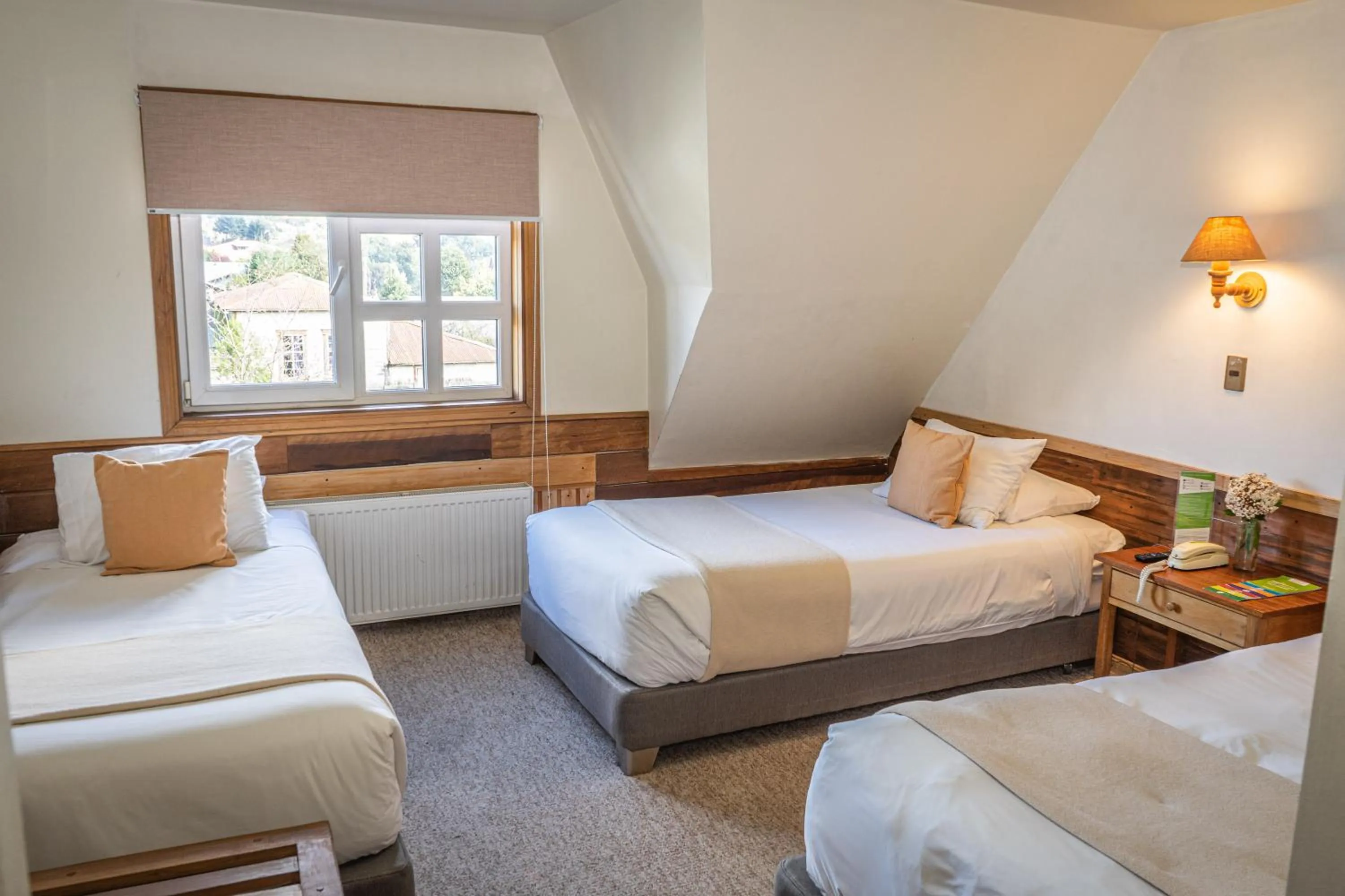 Photo of the whole room, Bed in Hotel Museo El Greco Puerto Varas