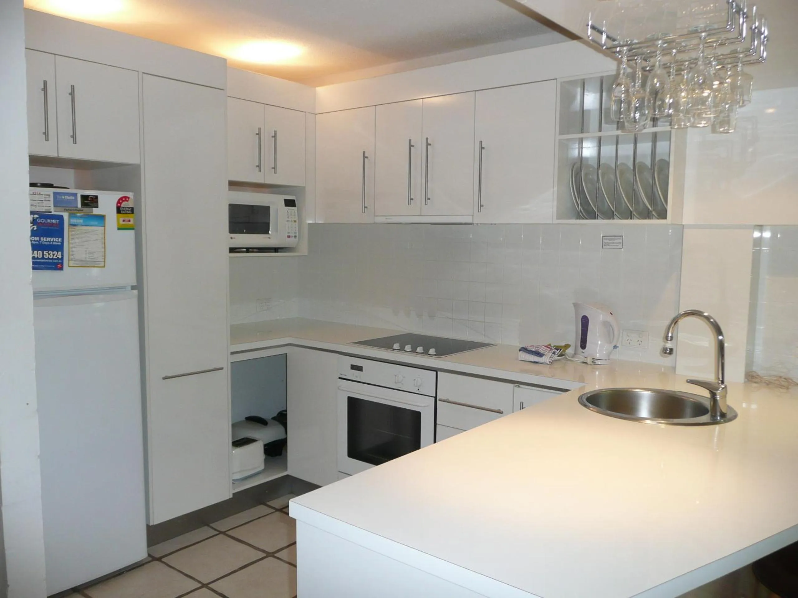 Kitchen or kitchenette in Noosa Harbour Resort