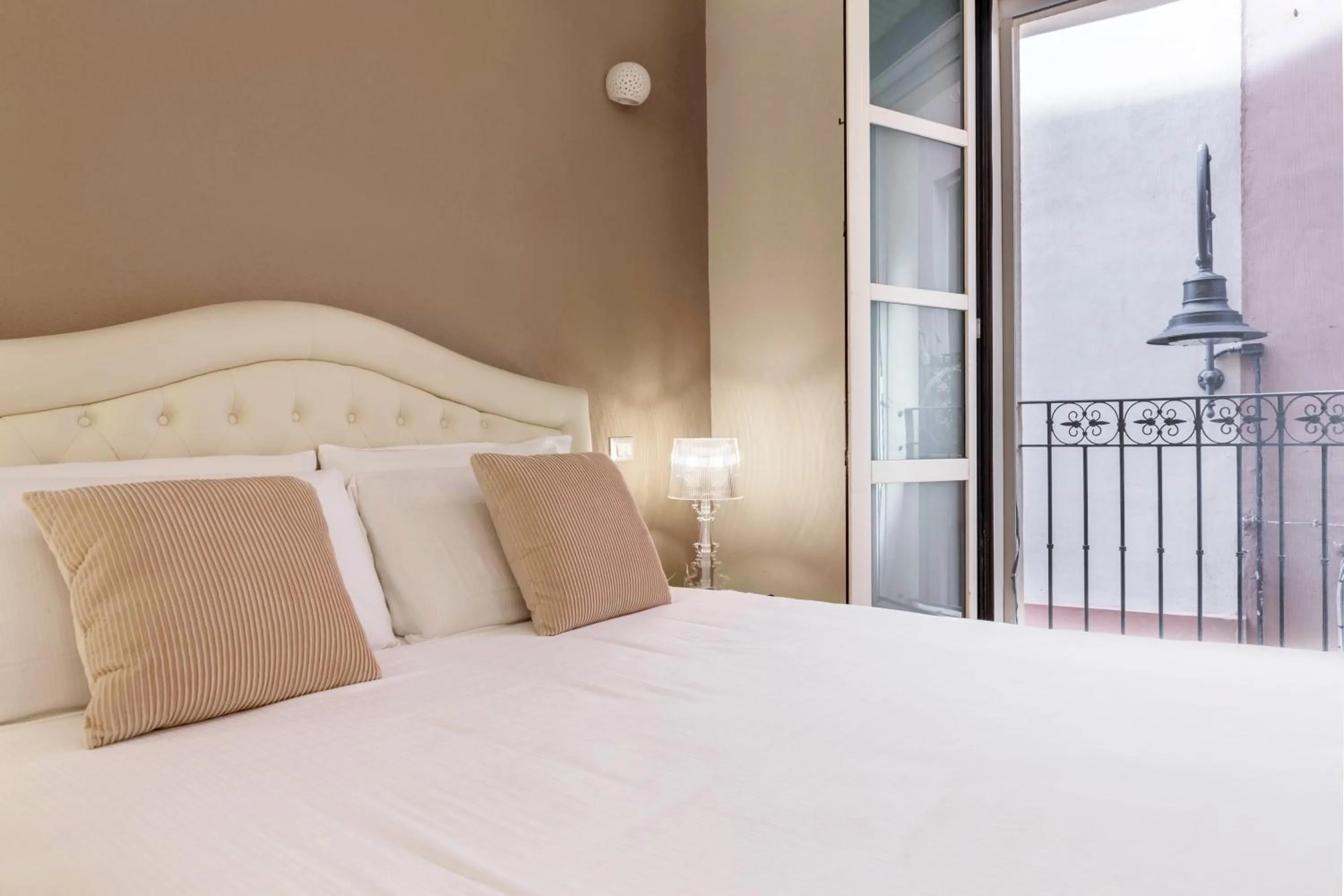 Bed in Martini Rooms Castello