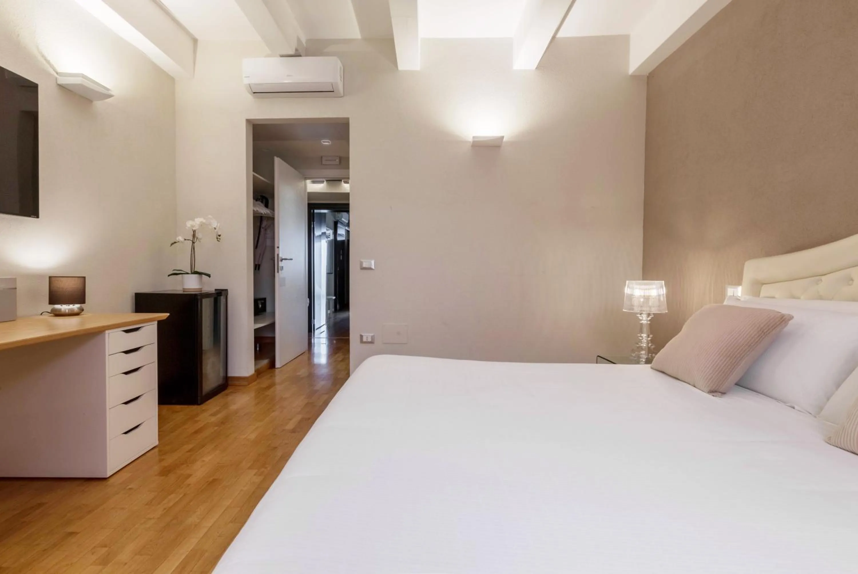 Bed in Martini Rooms Castello