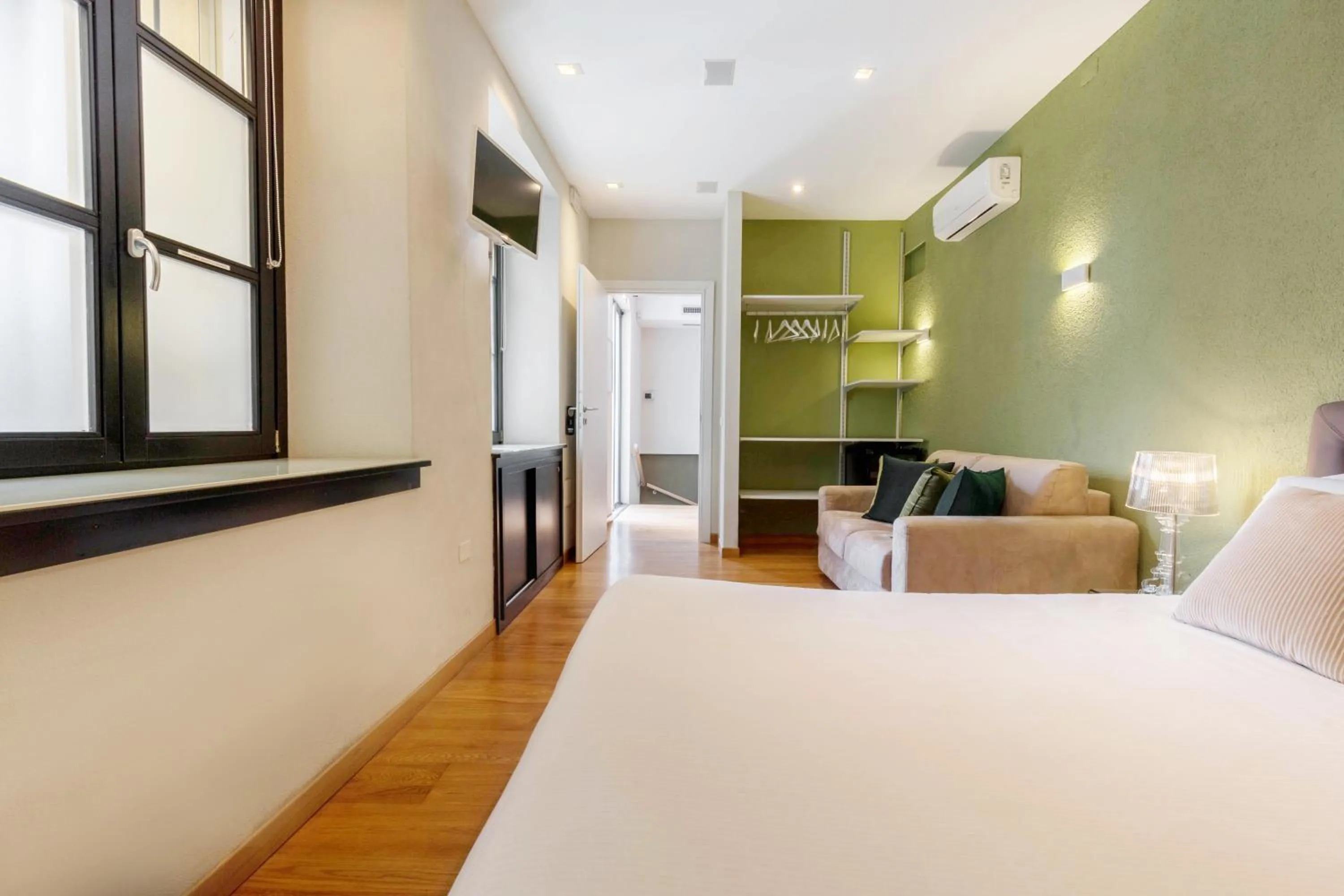 TV and multimedia, Bed in Martini Rooms Castello