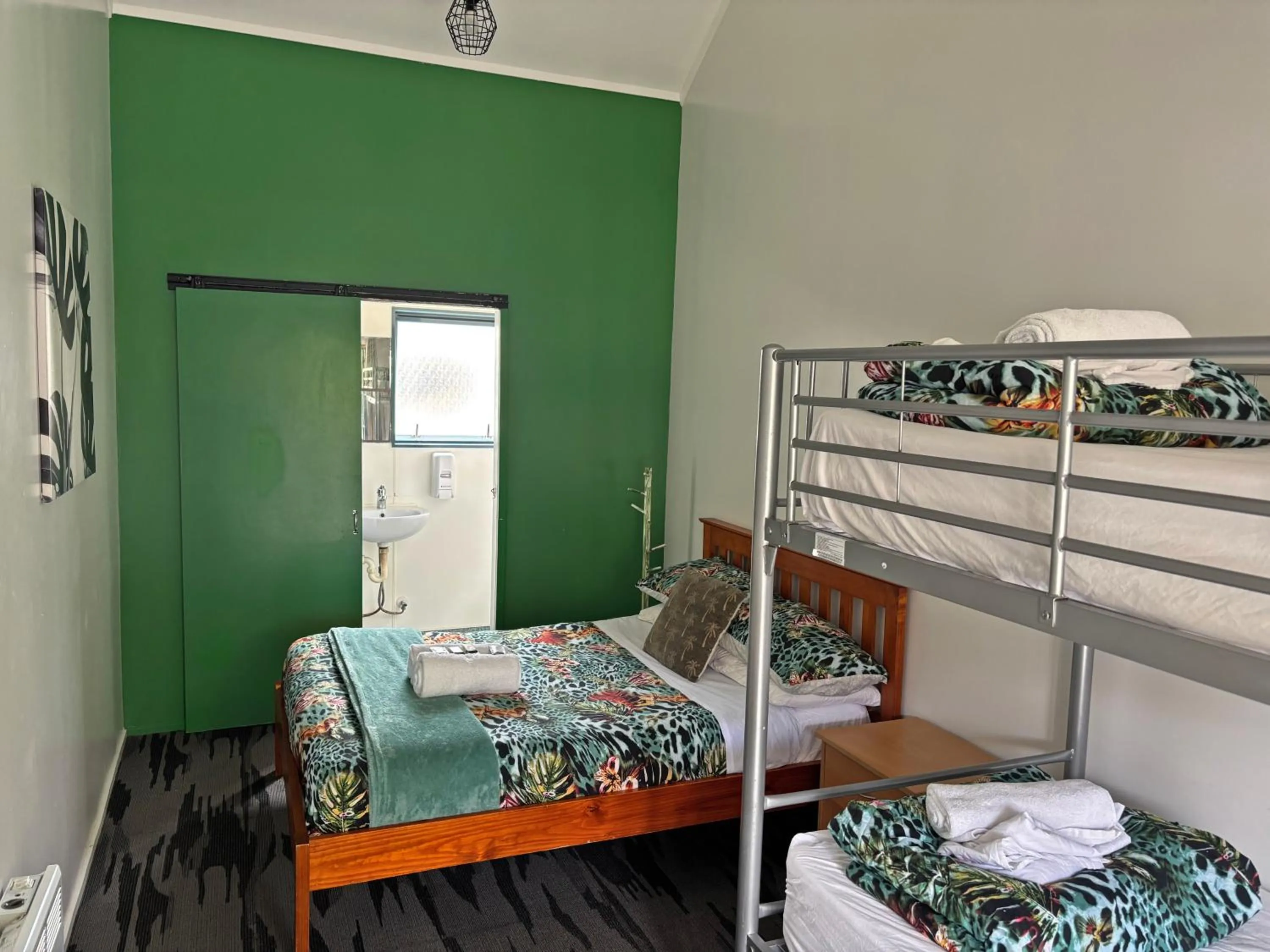 Bed in Peppertree Lodge