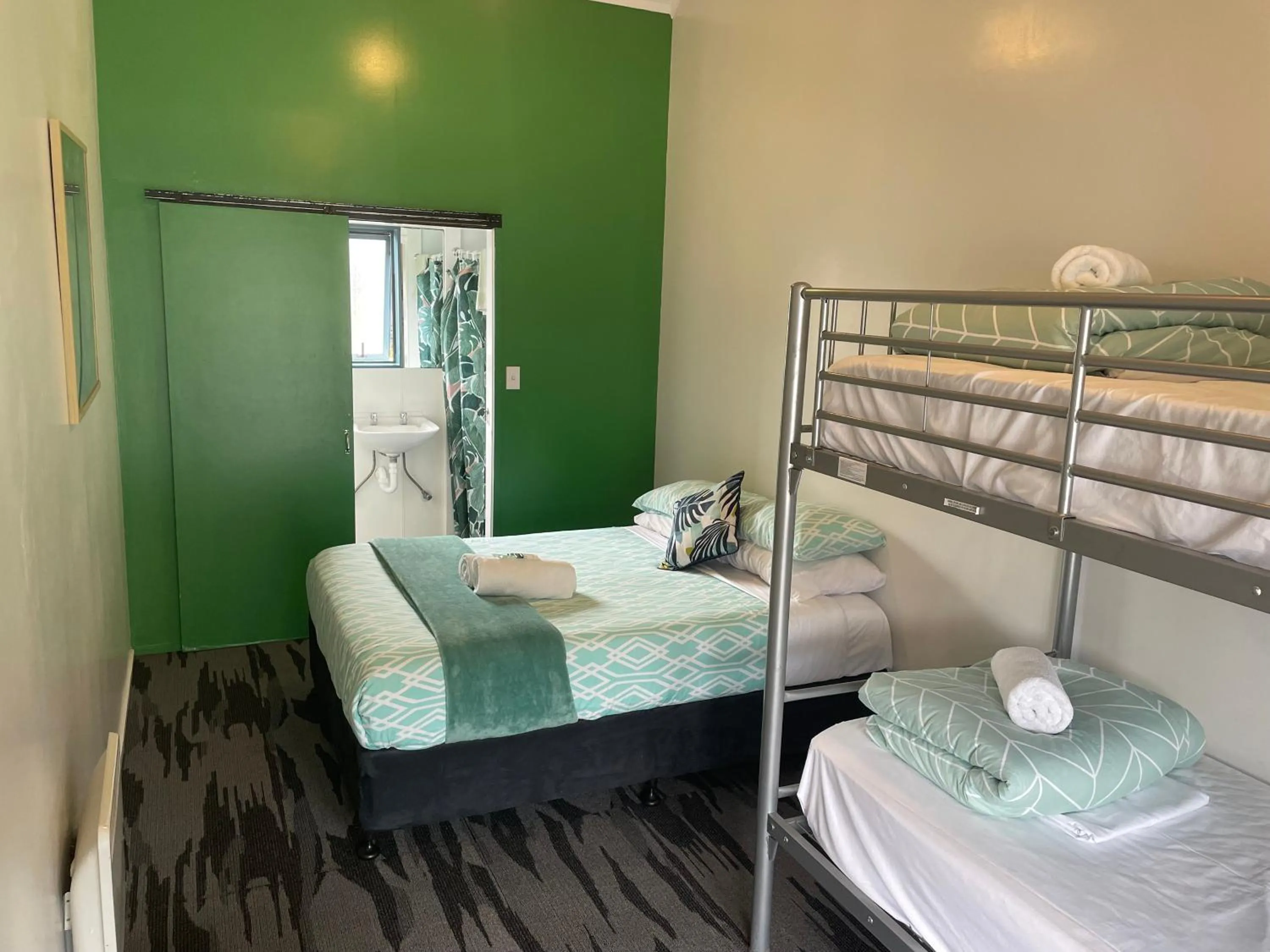 Bed in Peppertree Lodge