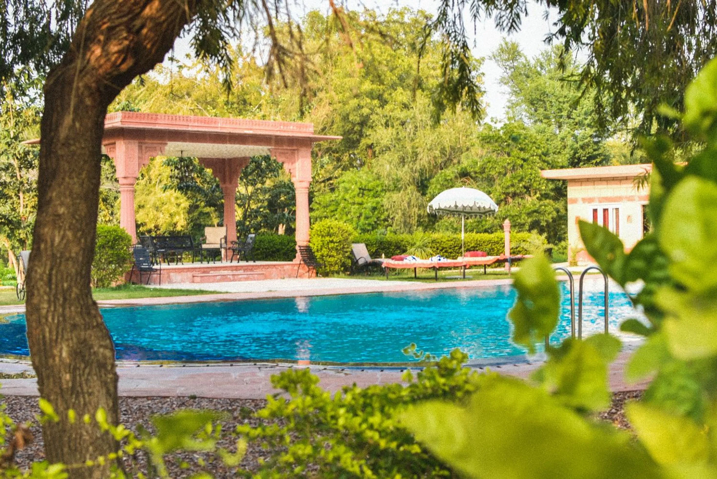 Swimming pool in Umaid Palace - A Lakeside Resort - 25 minutes from Mehandipur Balaji - 20 minutes from Chand Baori Stepwell Abhaneri & 40 minutes from Bhangarh Fort