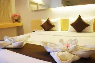 Bed in Khuang Singh Residence & Hotel Chiangmai