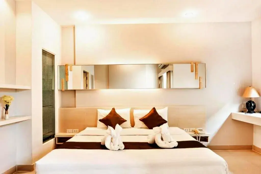 Bed in Khuang Singh Residence & Hotel Chiangmai Bed in Khuang Singh Residence & Hotel Chiangmai