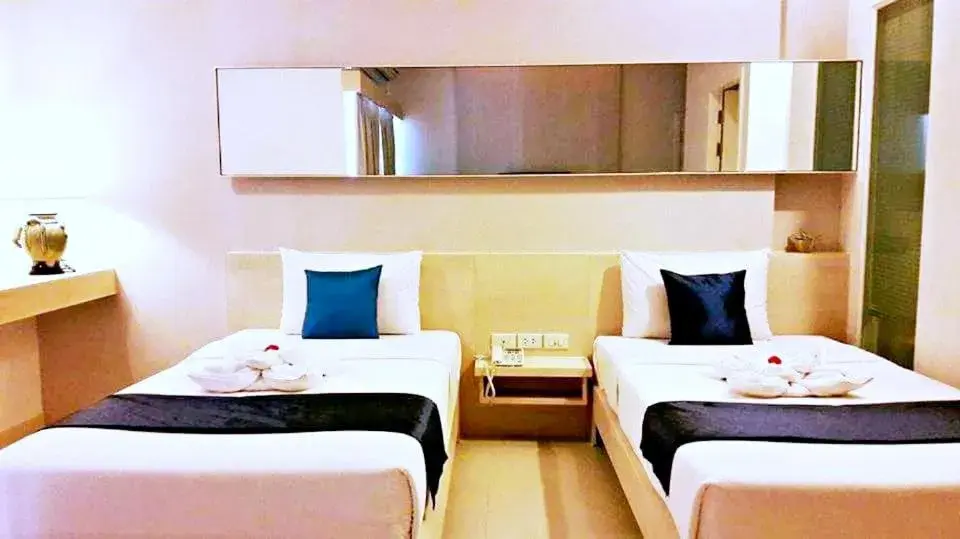 Bed in Khuang Singh Residence & Hotel Chiangmai Bed in Khuang Singh Residence & Hotel Chiangmai