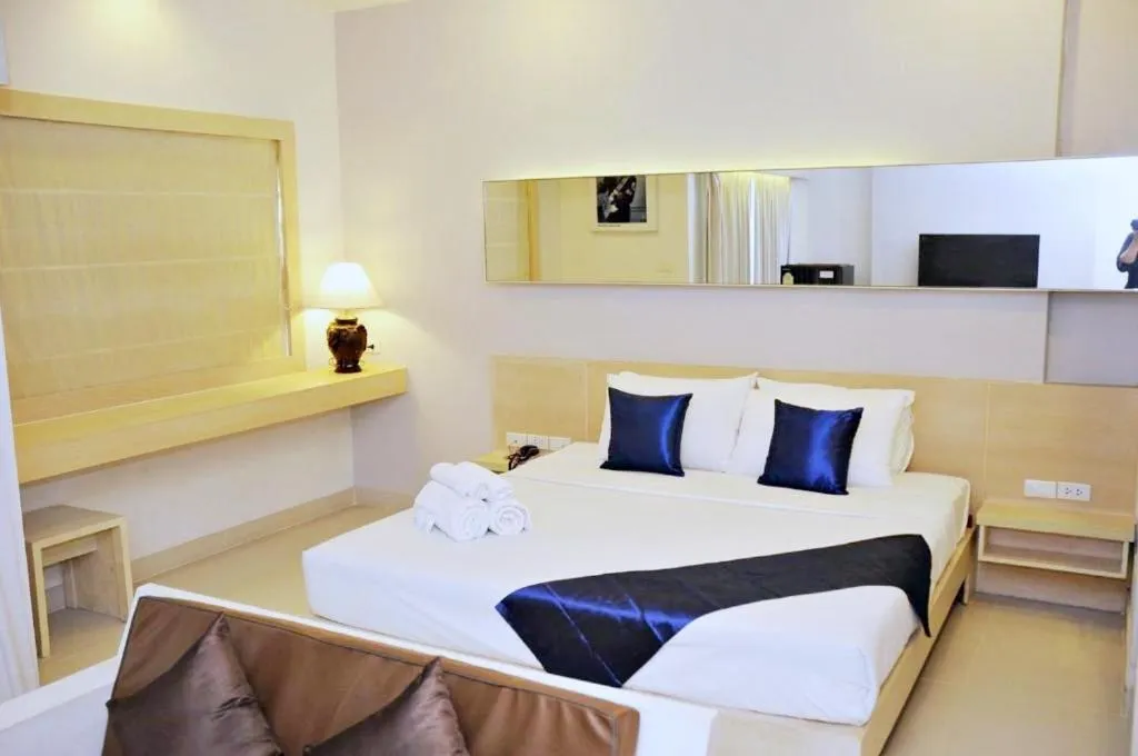 Bed in Khuang Singh Residence & Hotel Chiangmai