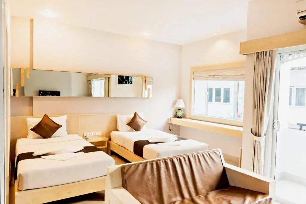 Bed in Khuang Singh Residence & Hotel Chiangmai Bed in Khuang Singh Residence & Hotel Chiangmai