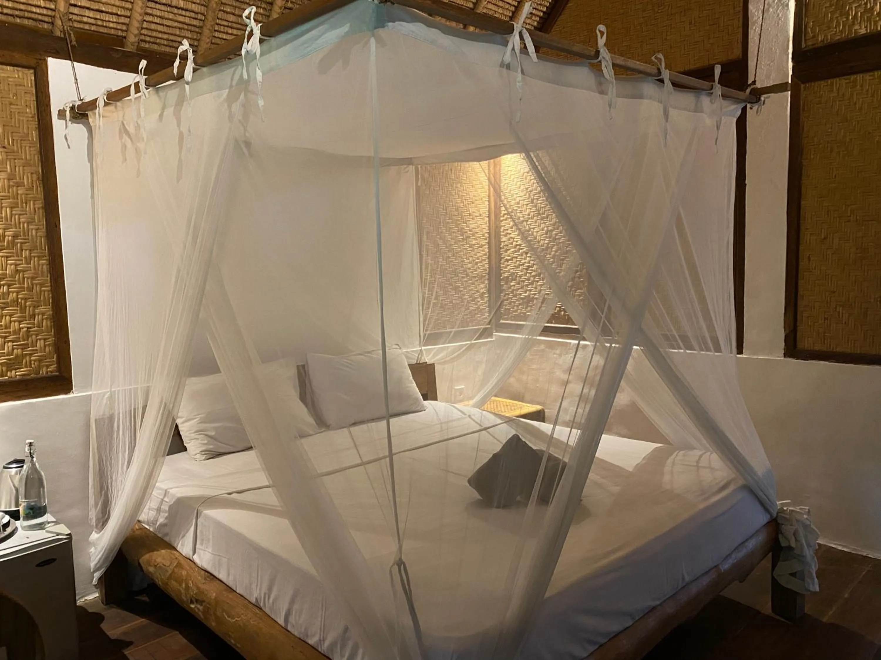 Bed in Flower Bud Bungalow Balangan