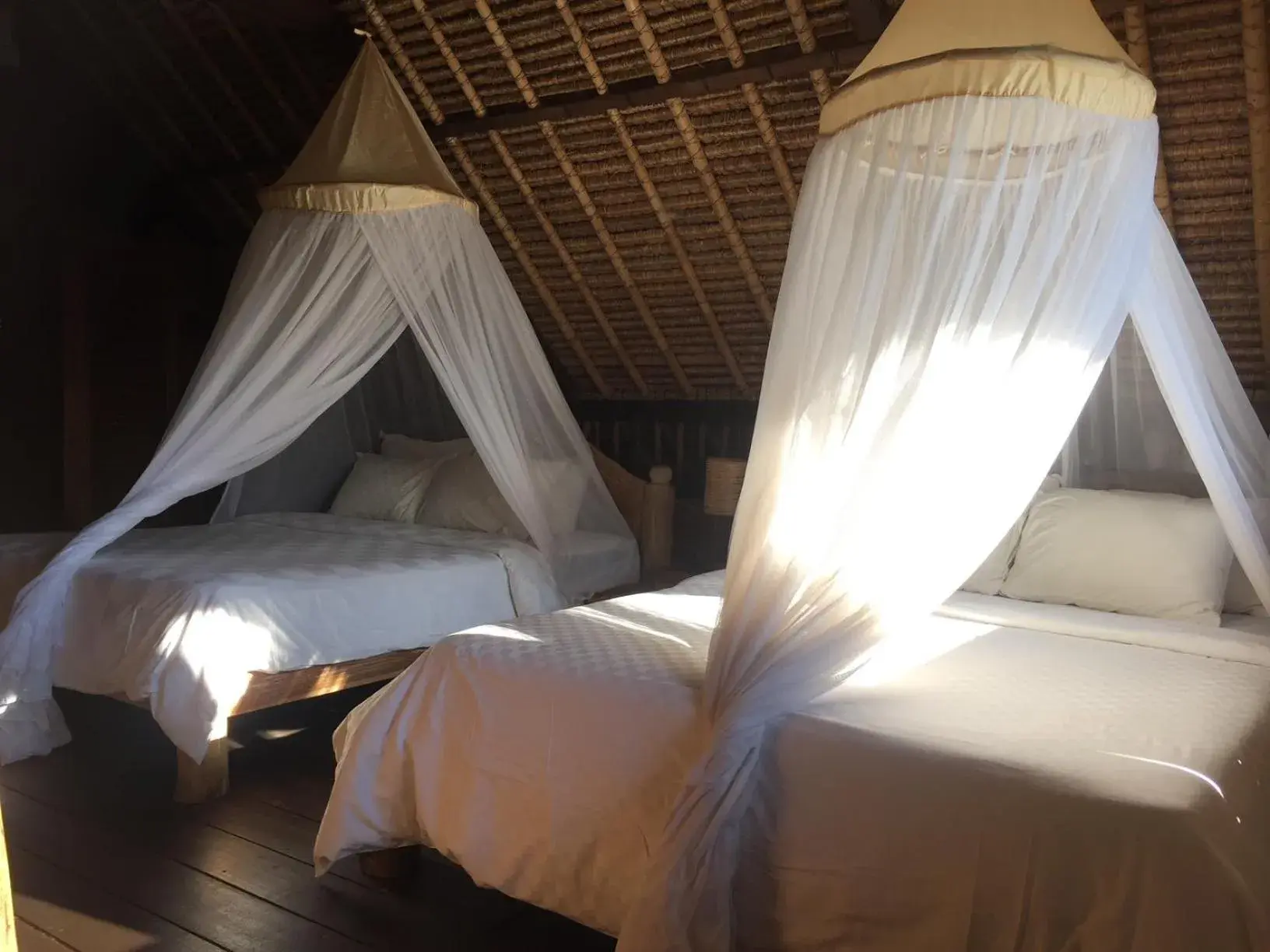 Bed in Flower Bud Bungalow Balangan Bed in Flower Bud Bungalow Balangan