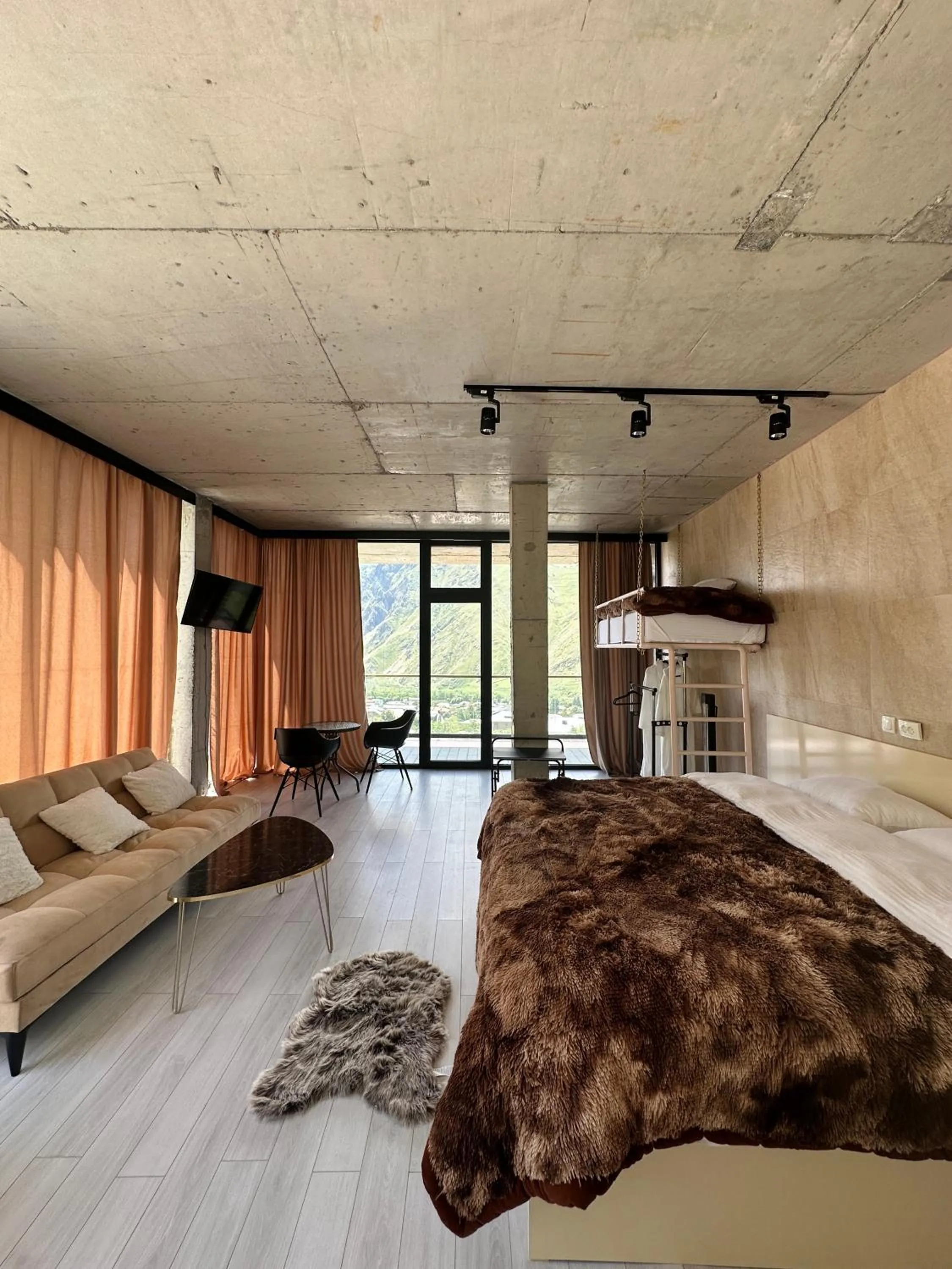 Bed in Hotel NOA Kazbegi