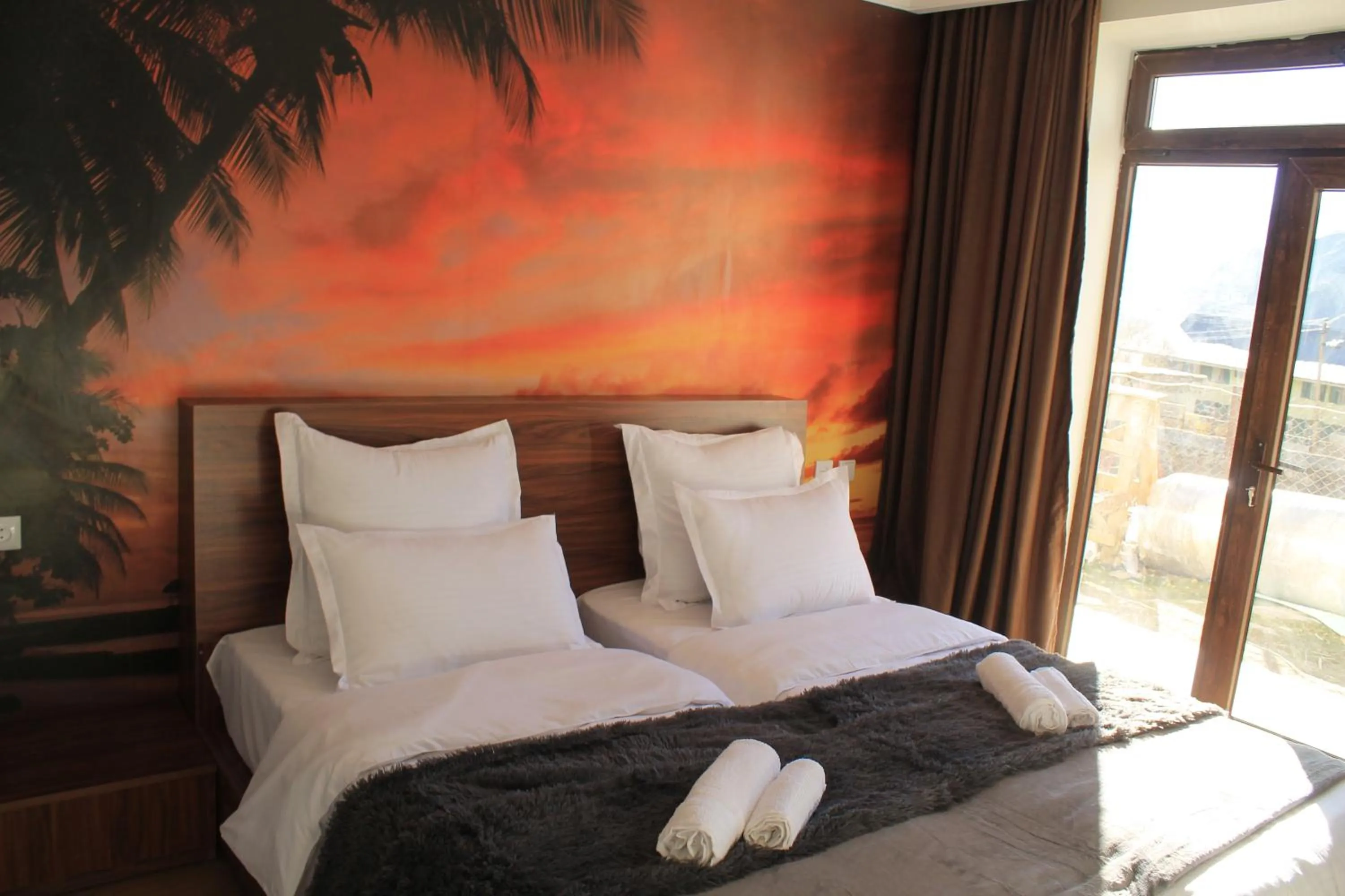 Bed in Hotel NOA Kazbegi