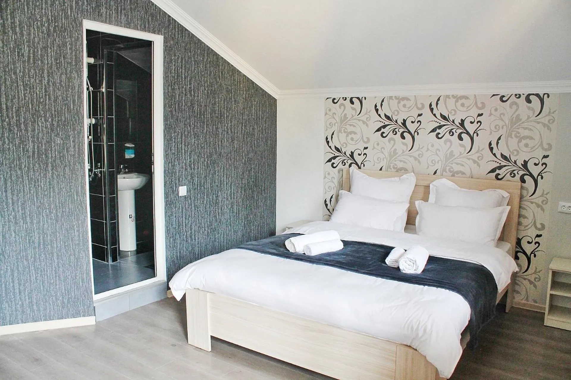 Bed in Hotel NOA Kazbegi