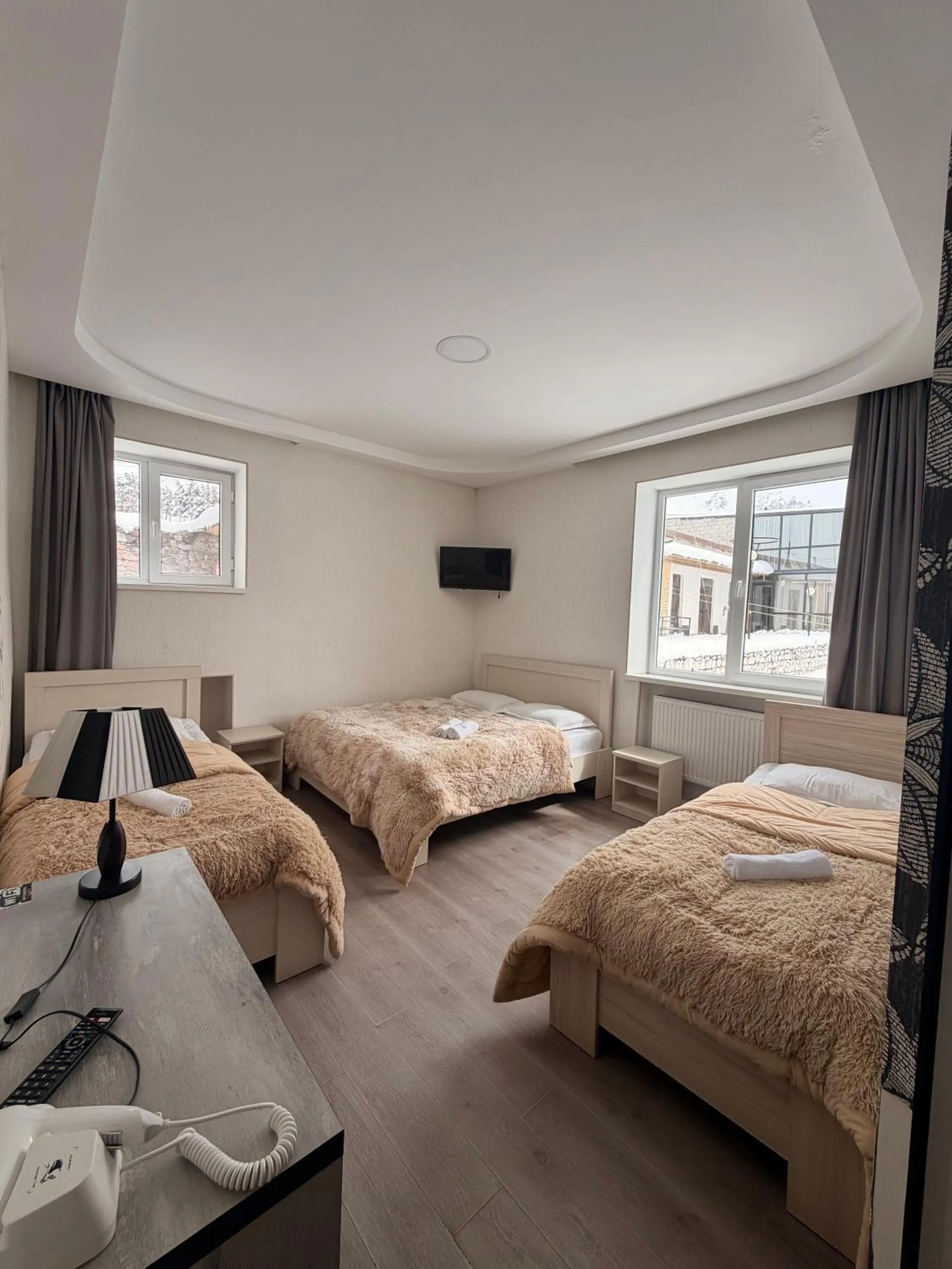 Bed in Hotel NOA Kazbegi